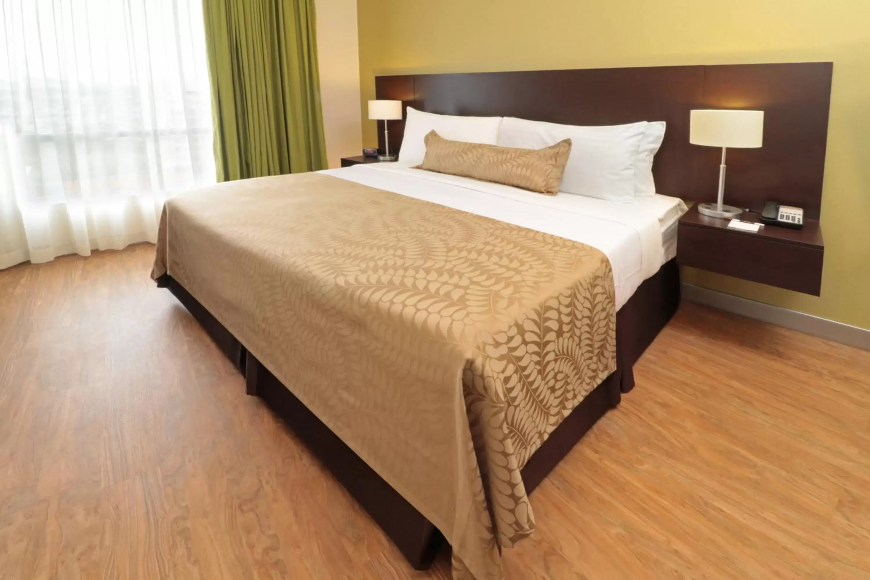 Bed in Staybridge Suites San Luis Potosi, an IHG Hotel