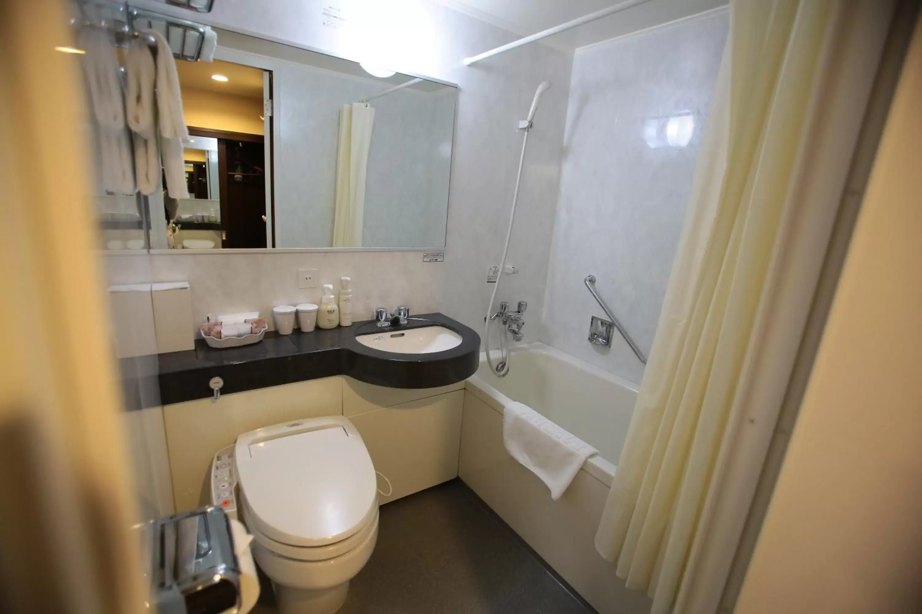 Photo of the whole room, Bathroom in International Hotel Ube