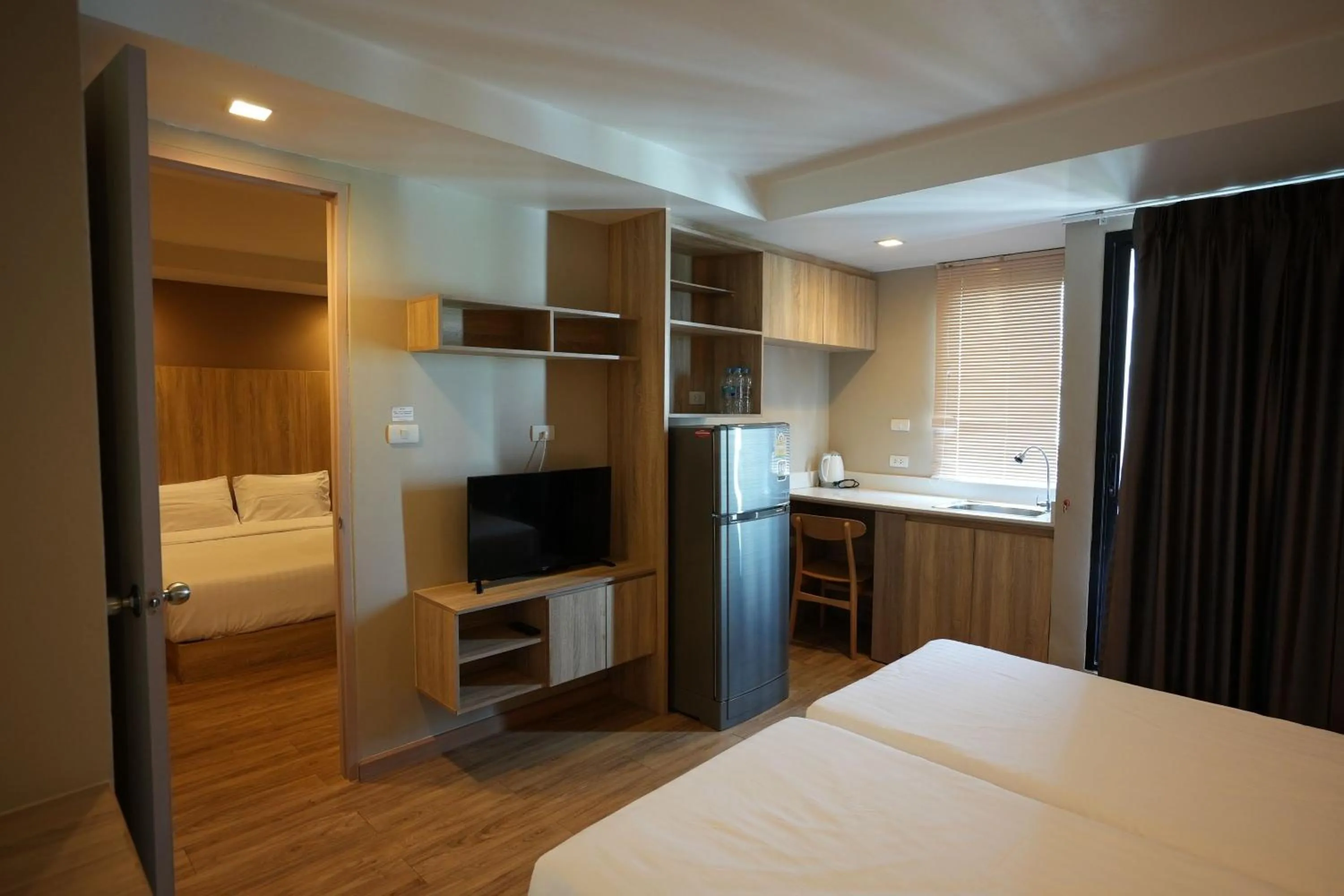 Photo of the whole room, Bed in Baan Tanwa - MRT Ratchadapisek Exit 1 or 2