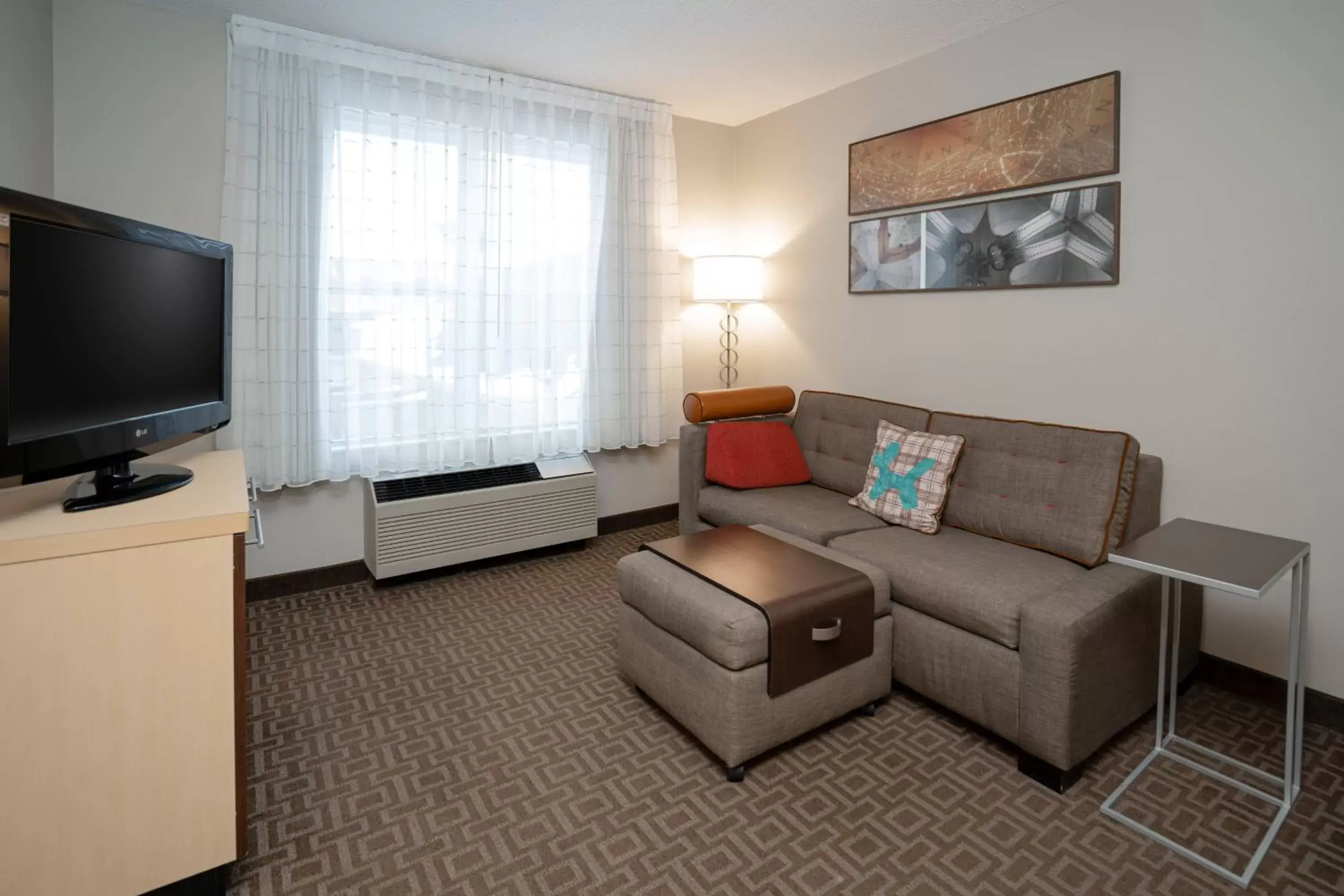 Bedroom, Seating Area in TownePlace Suites Rochester