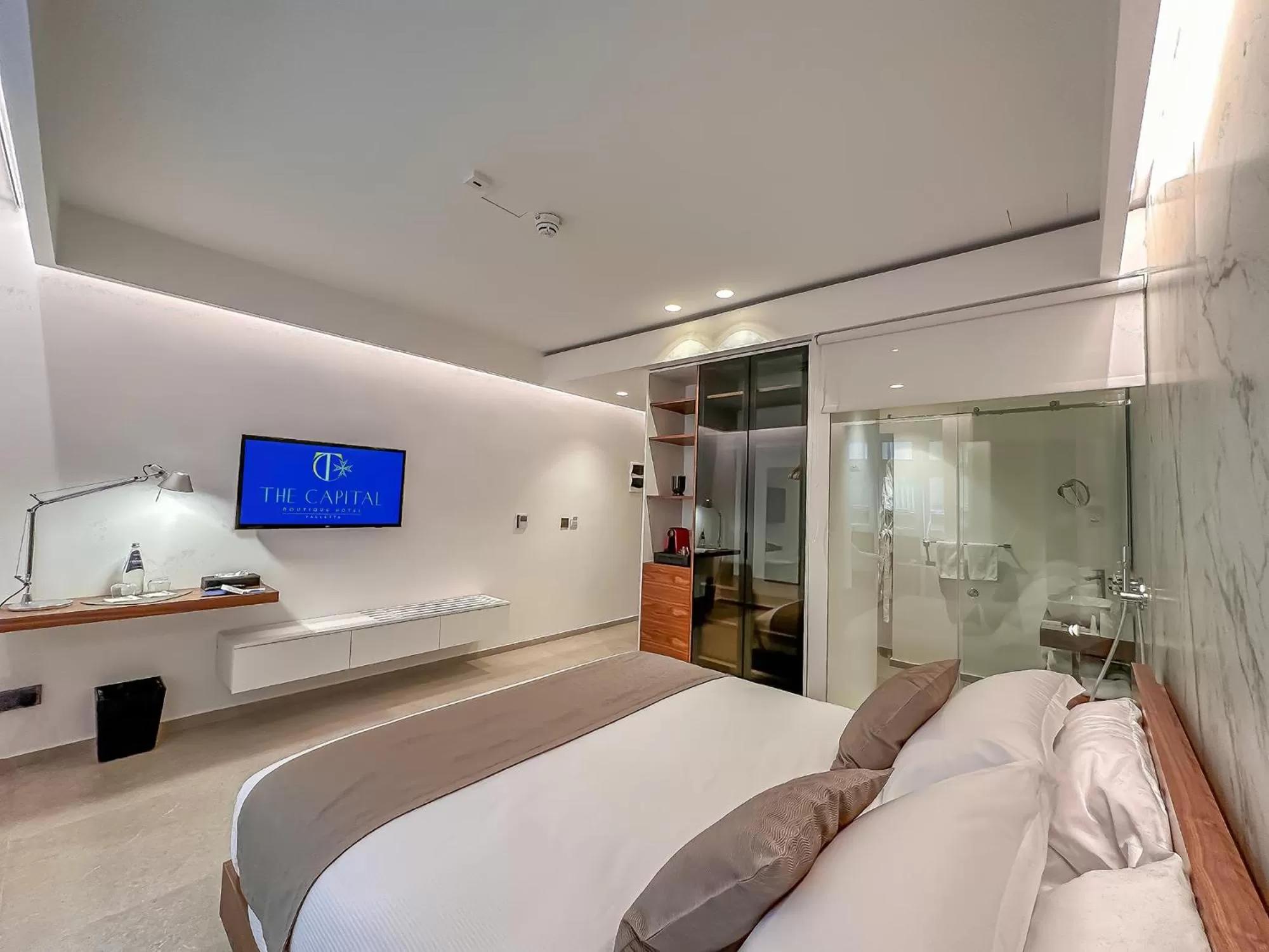 Bed in The Capital Boutique Hotel