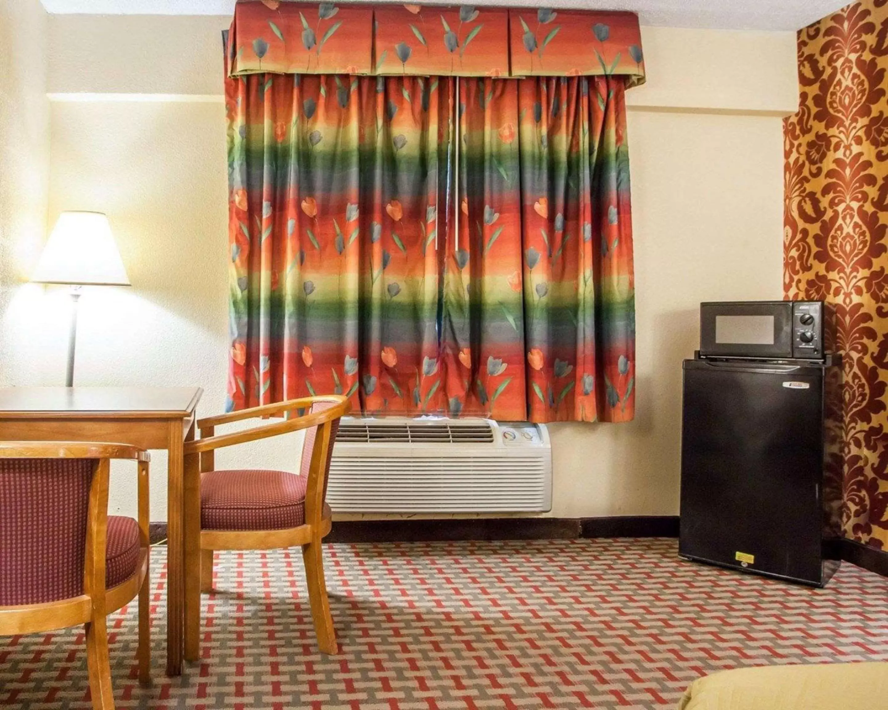 Photo of the whole room, TV/Entertainment Center in Days Inn by Wyndham Jersey City