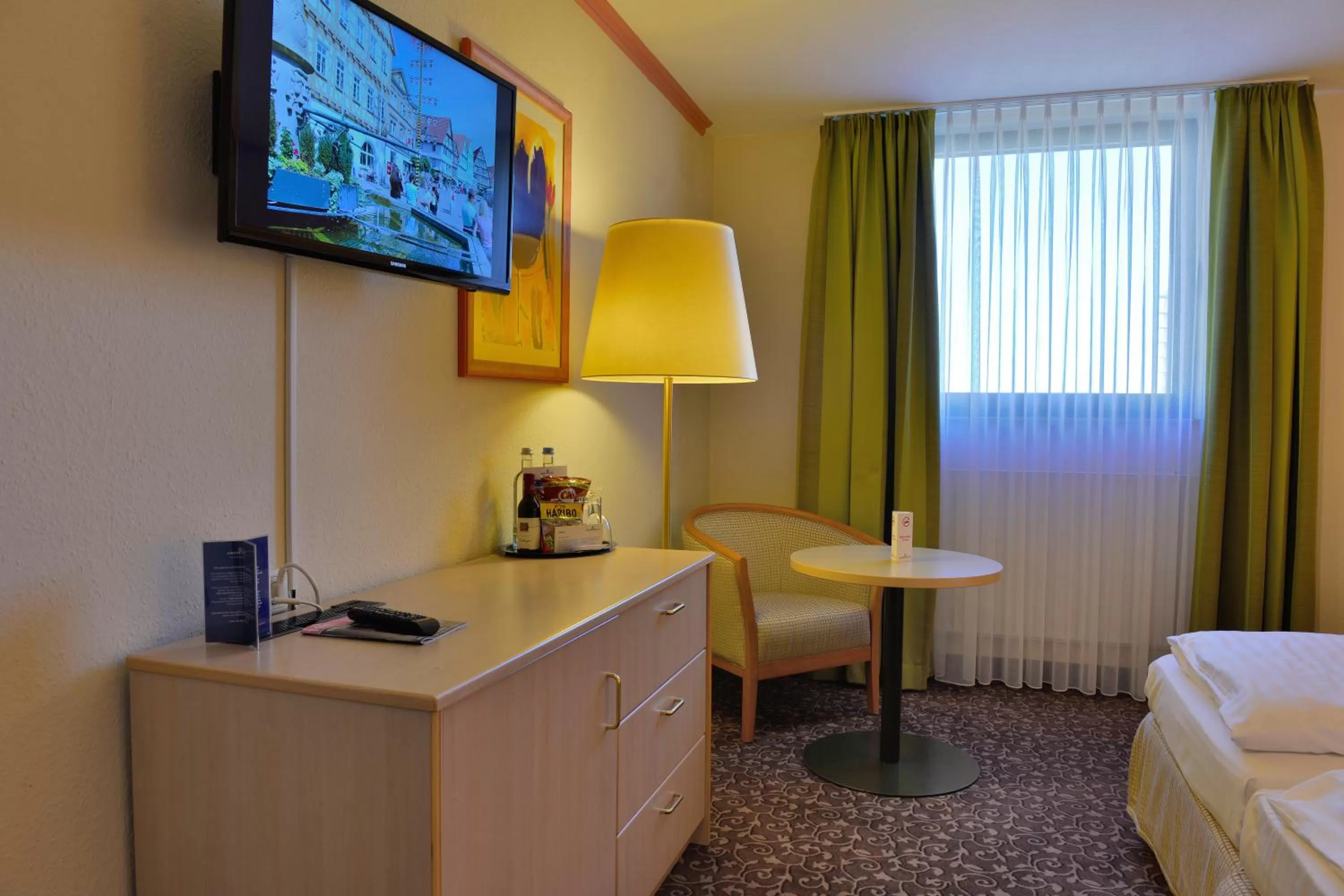 View (from property/room), Bed in PLAZA INN Leonberg