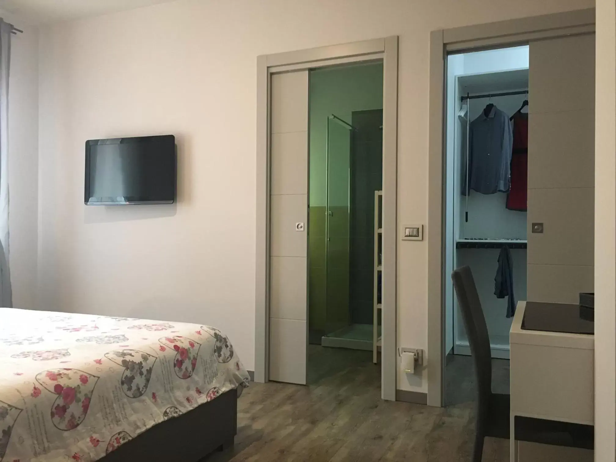 Bedroom, TV/Entertainment Center in B&B ARCOBALENO