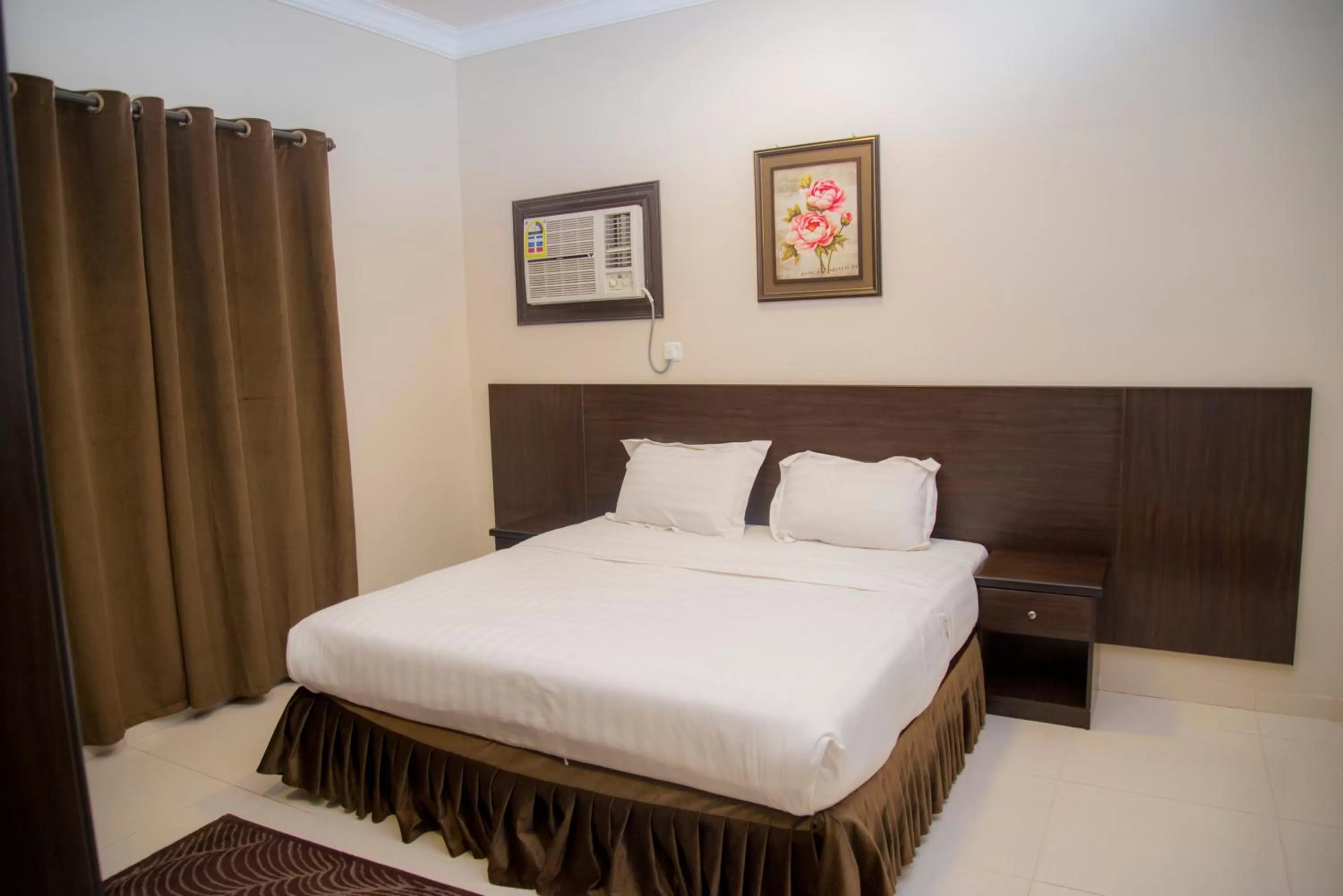 Bedroom, Bed in Shams Suites Furnished Units