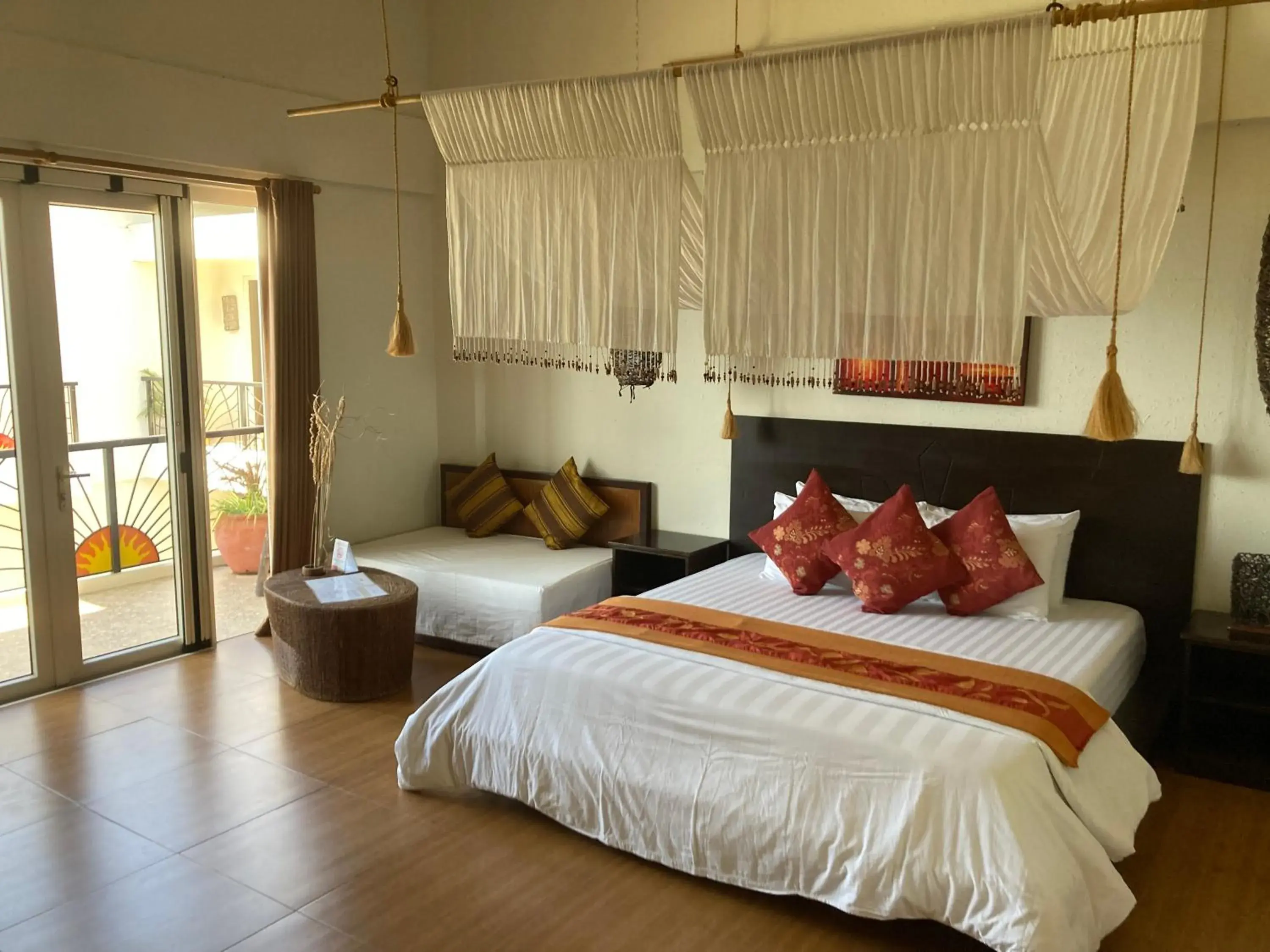 Photo of the whole room, Bed in Sunset At Aninuan Beach Resort