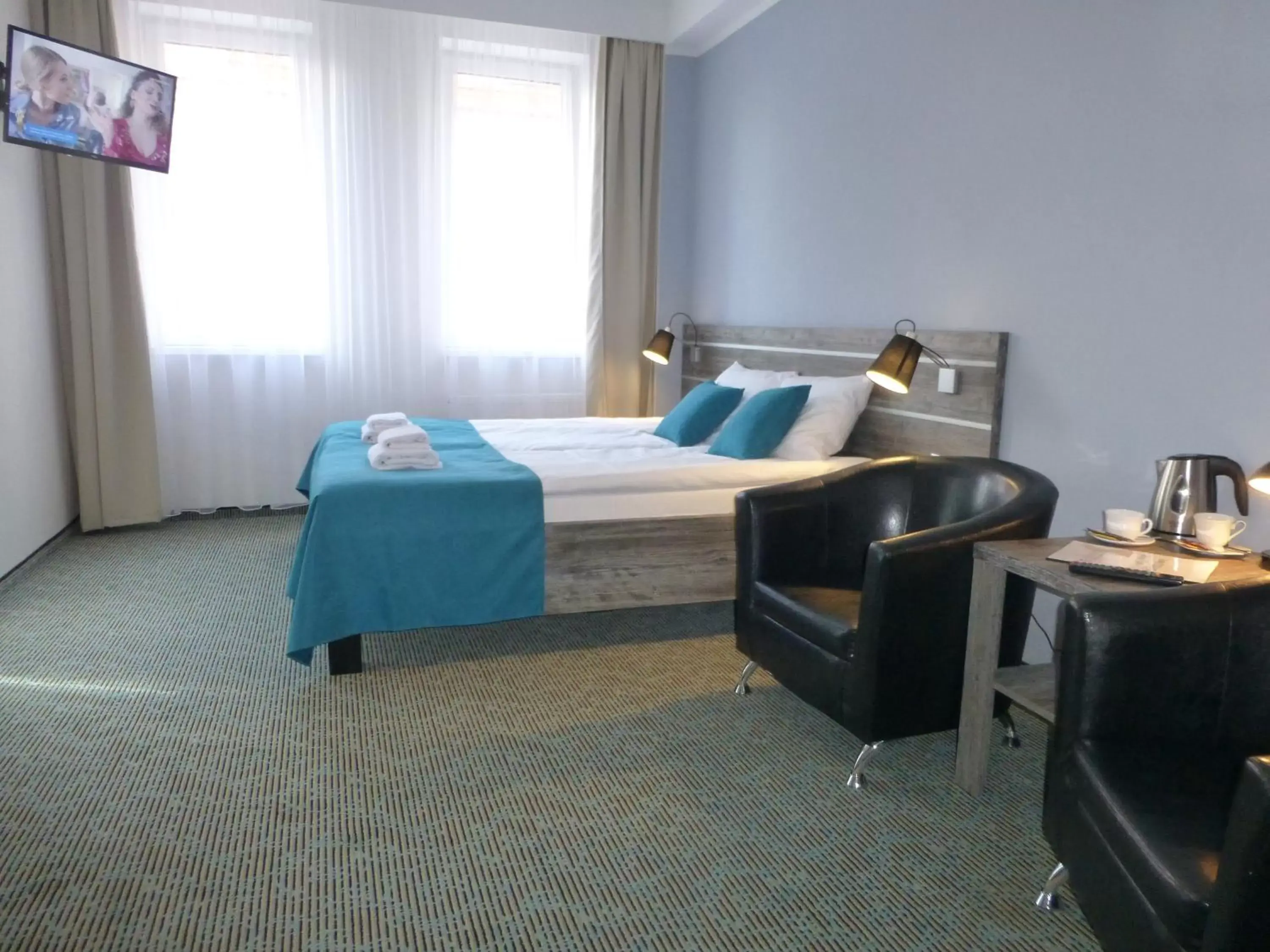 Deluxe Queen Room with Two Queen Beds in Hotel Giżycko Deluxe Queen Room with Two Queen Beds in Hotel Giżycko