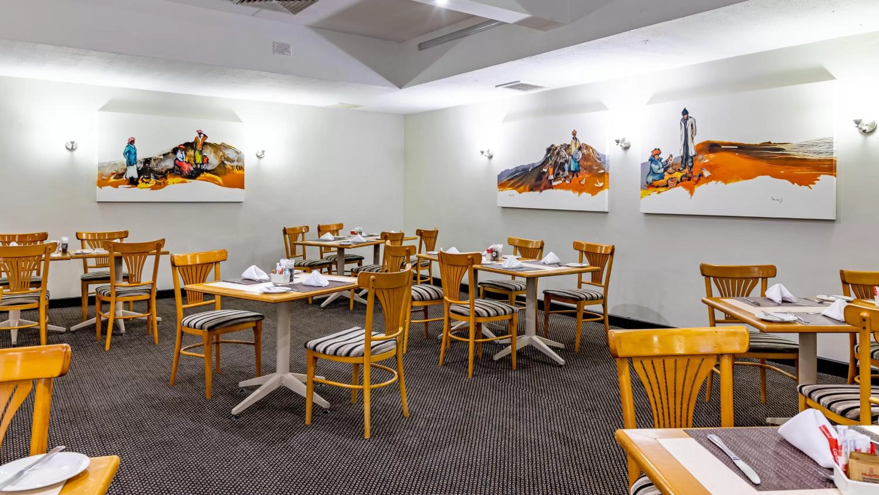 Dining area in African Sky Newcastle Inn