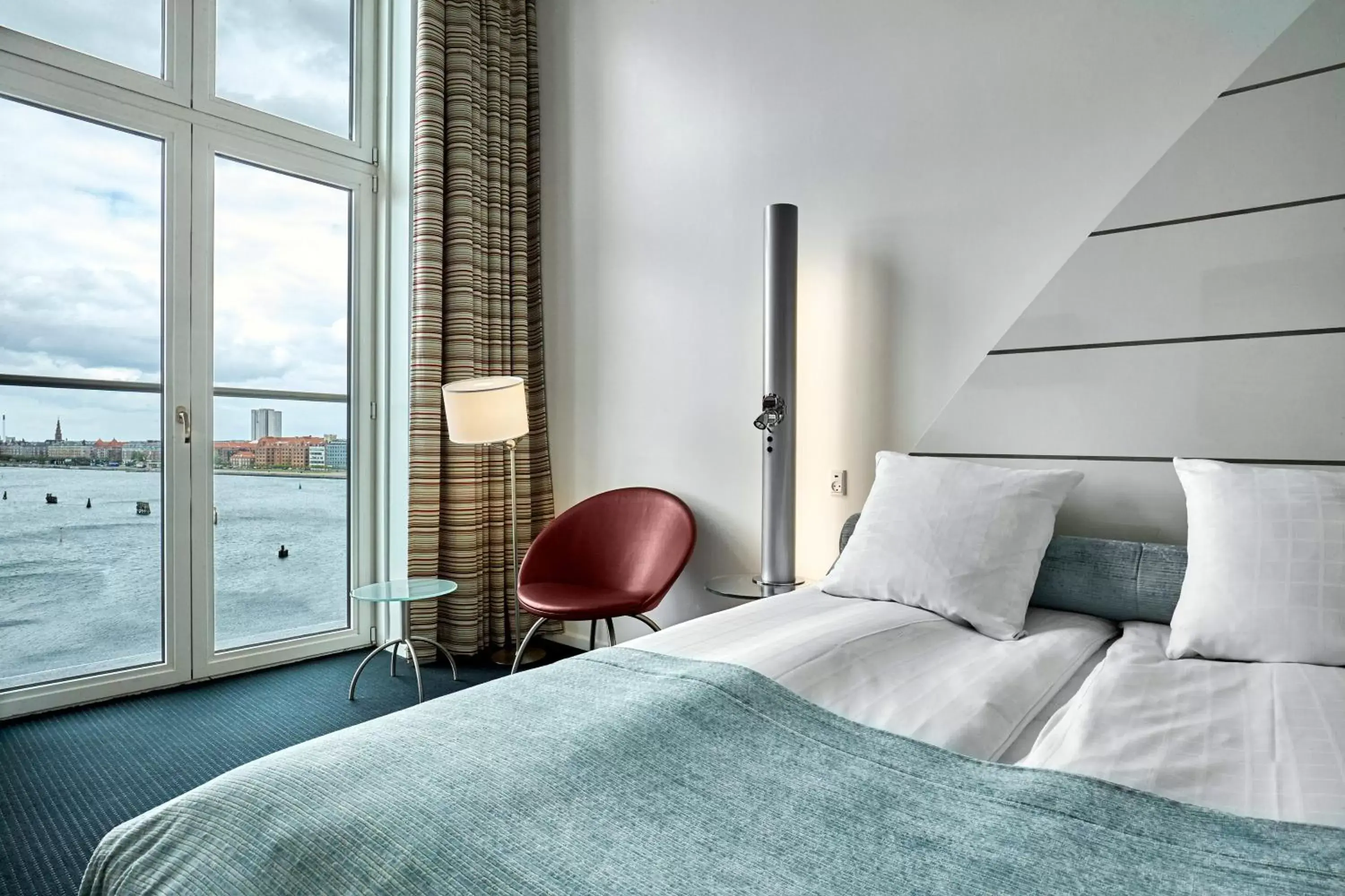 Bed in Copenhagen Island Hotel