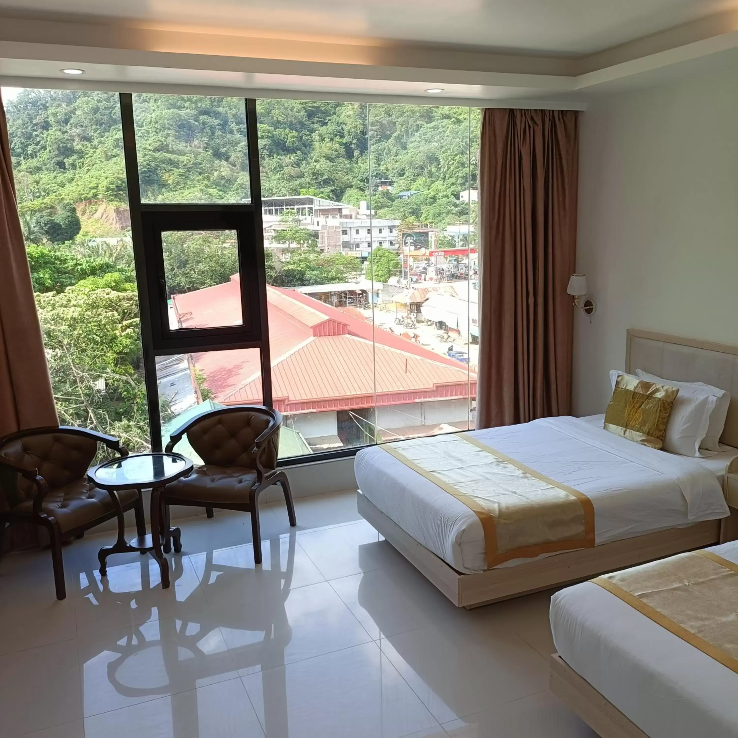 City view, Bed in One El Nido Suite City view, Bed in One El Nido Suite