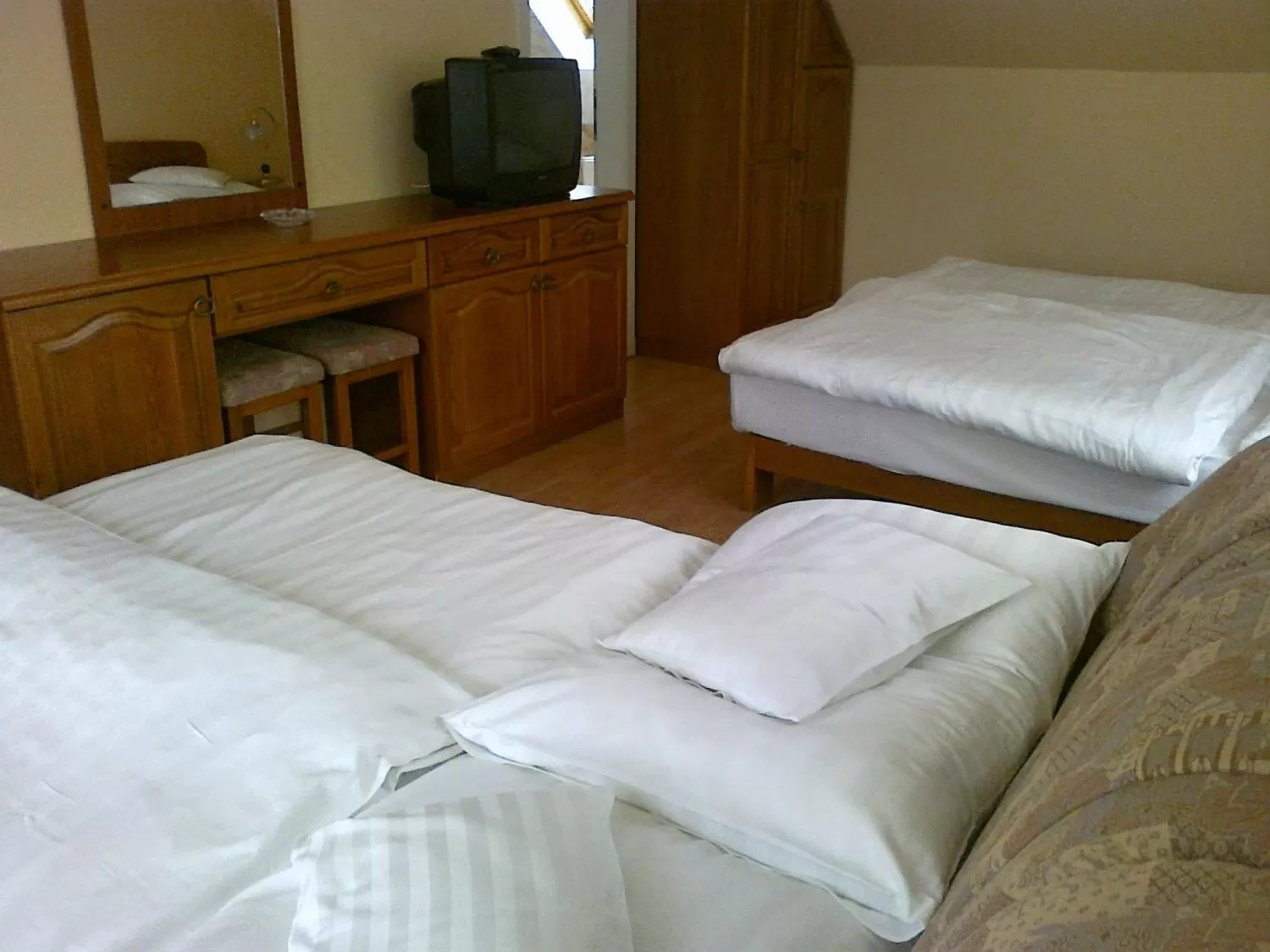 Bed in Szieszta Panzió