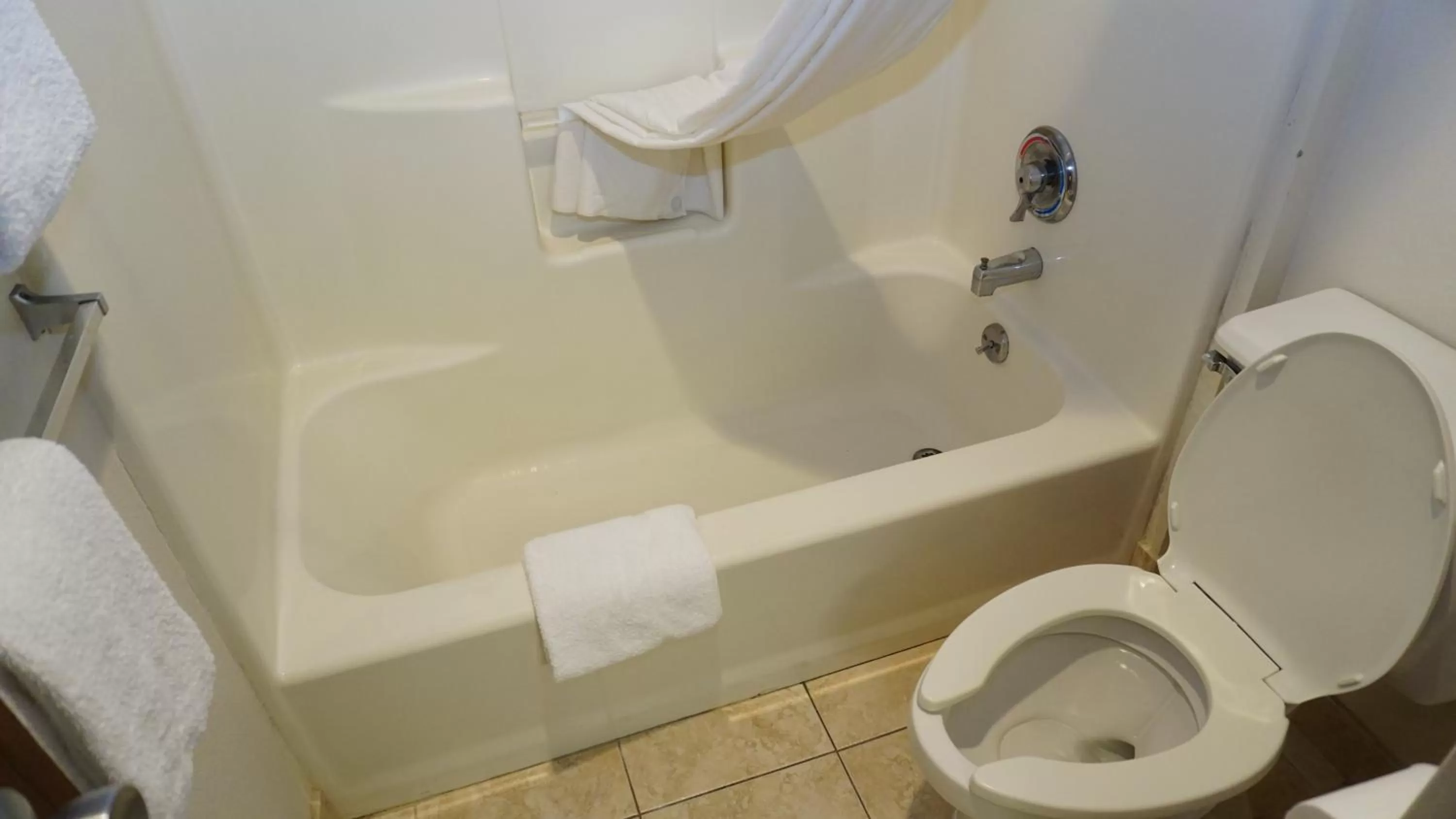 Bathroom in Baymont by Wyndham Arlington At Six Flags Dr