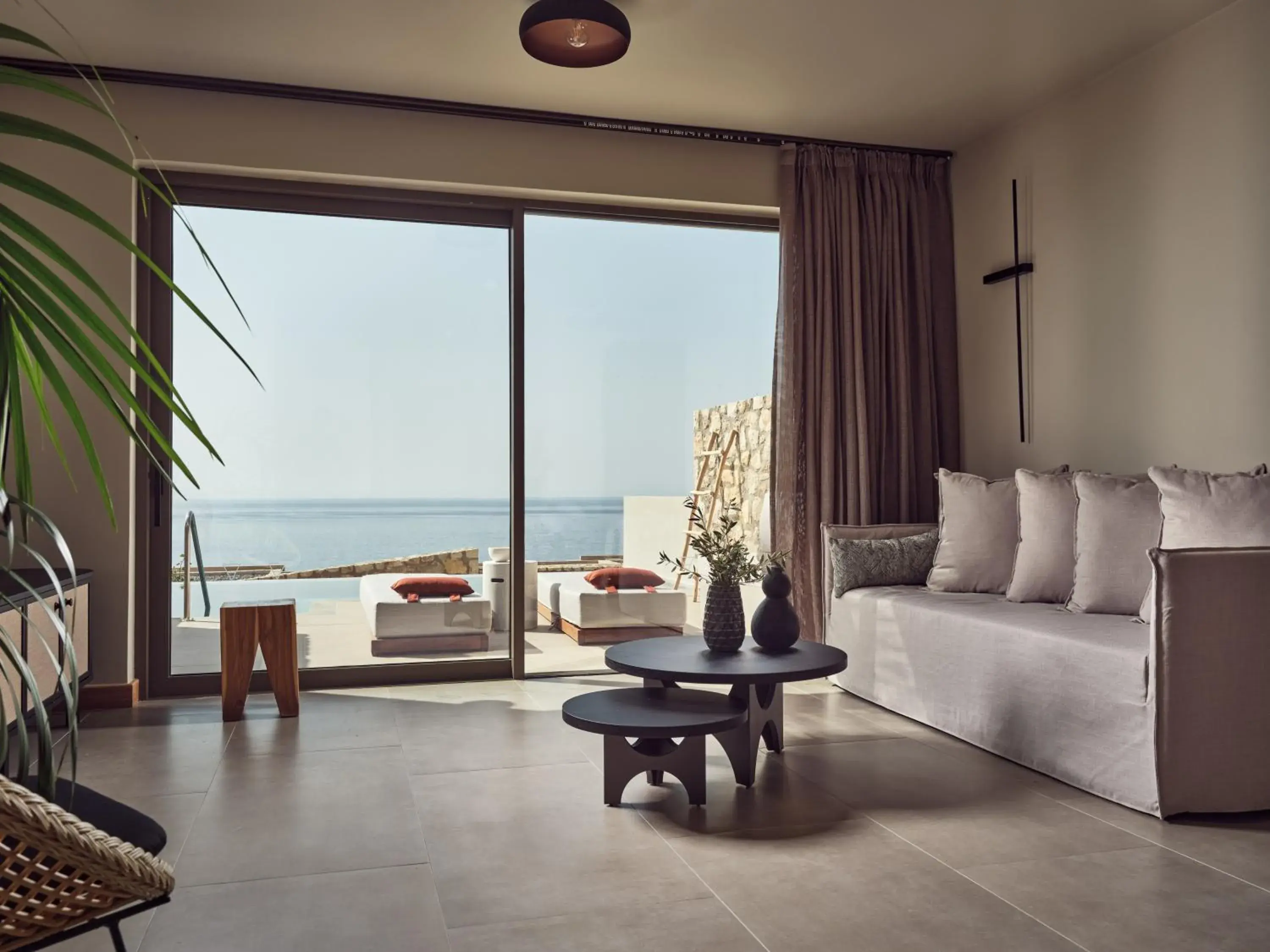 Living room in The Royal Senses Resort Crete, Curio Collection by Hilton