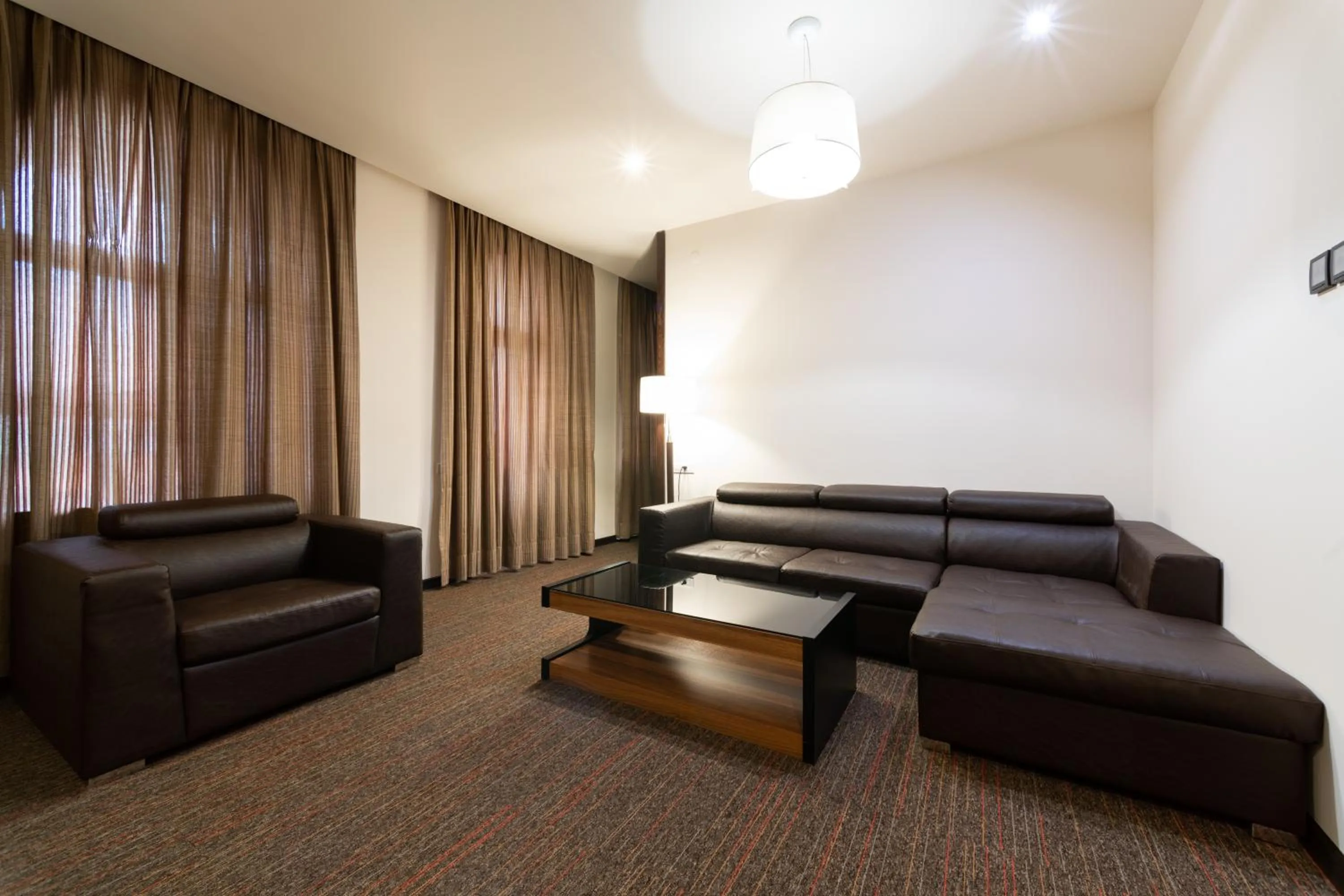 Seating area in Bass Boutique Hotel