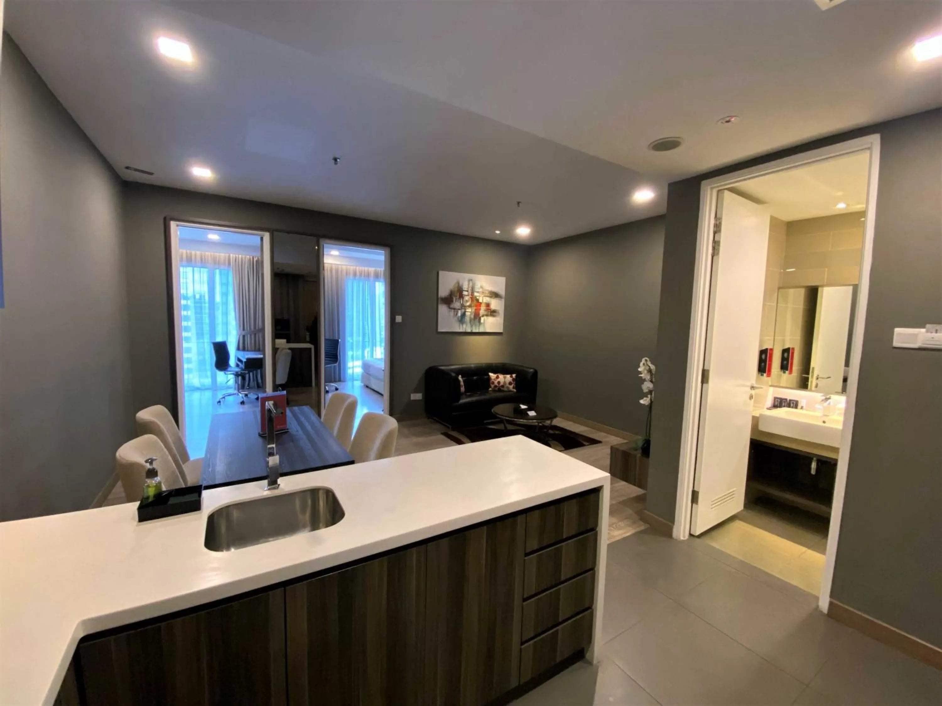 Living room, Bed in Ramada Suites by Wyndham Kuala Lumpur City Centre