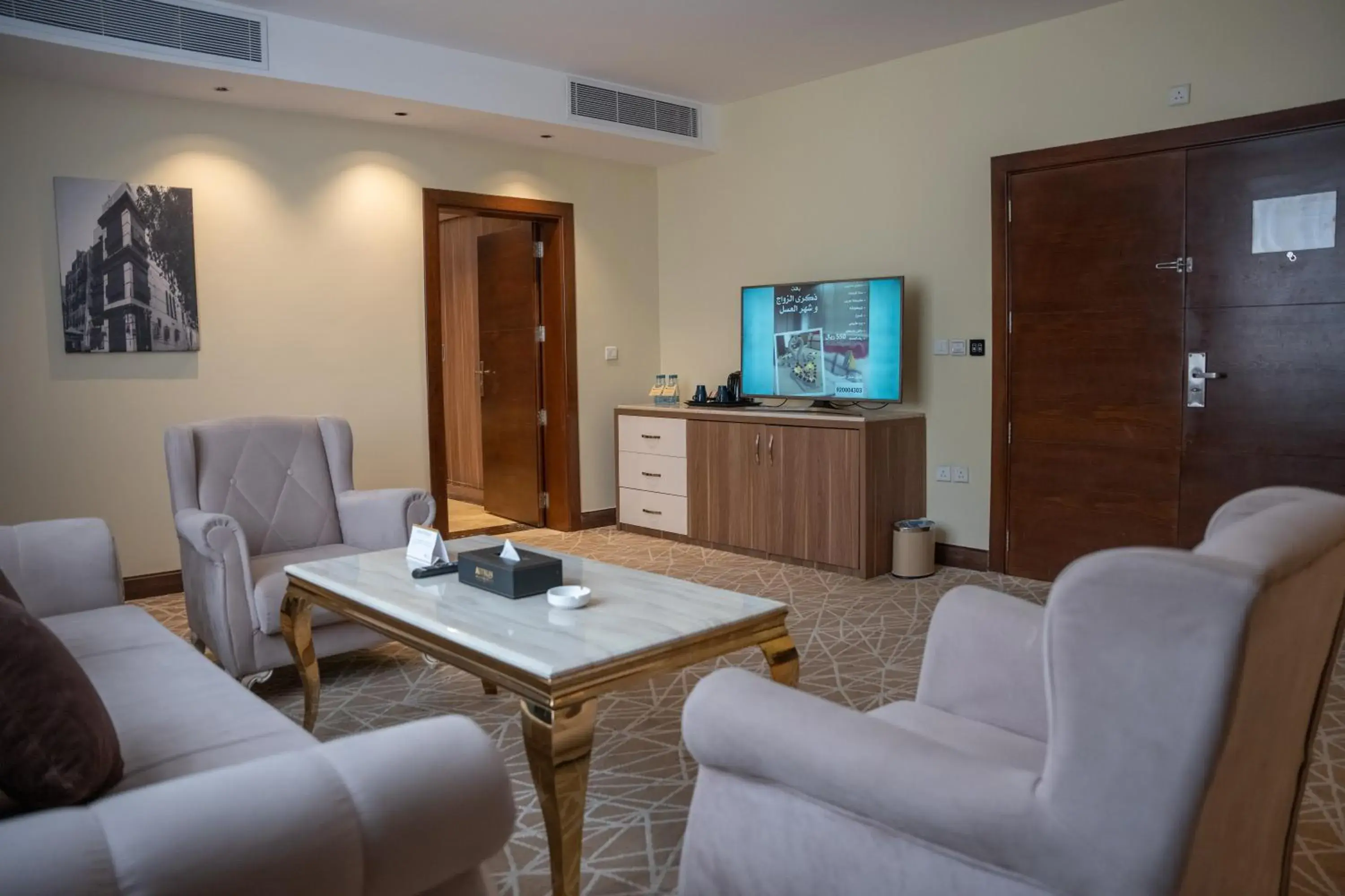 Communal lounge/ TV room, Seating Area in Address Al Hamra Hotel