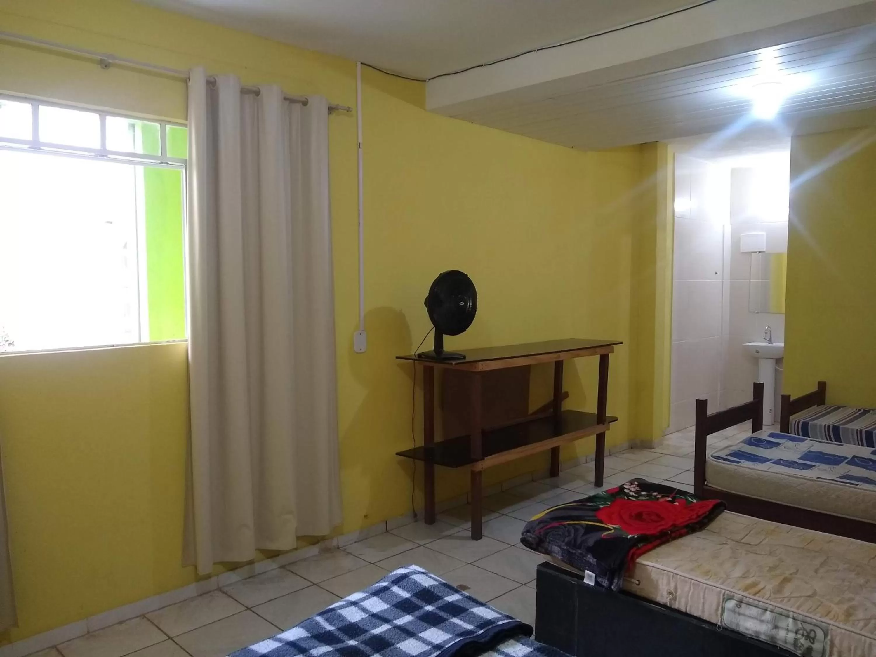 Bed in Pousada do Ribeirão