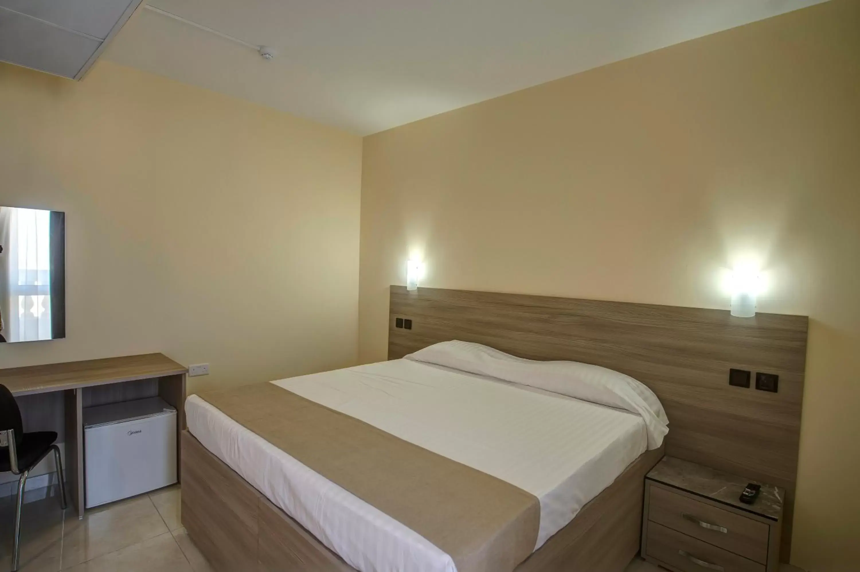 Bed in Allegro Hotel Bed in Allegro Hotel