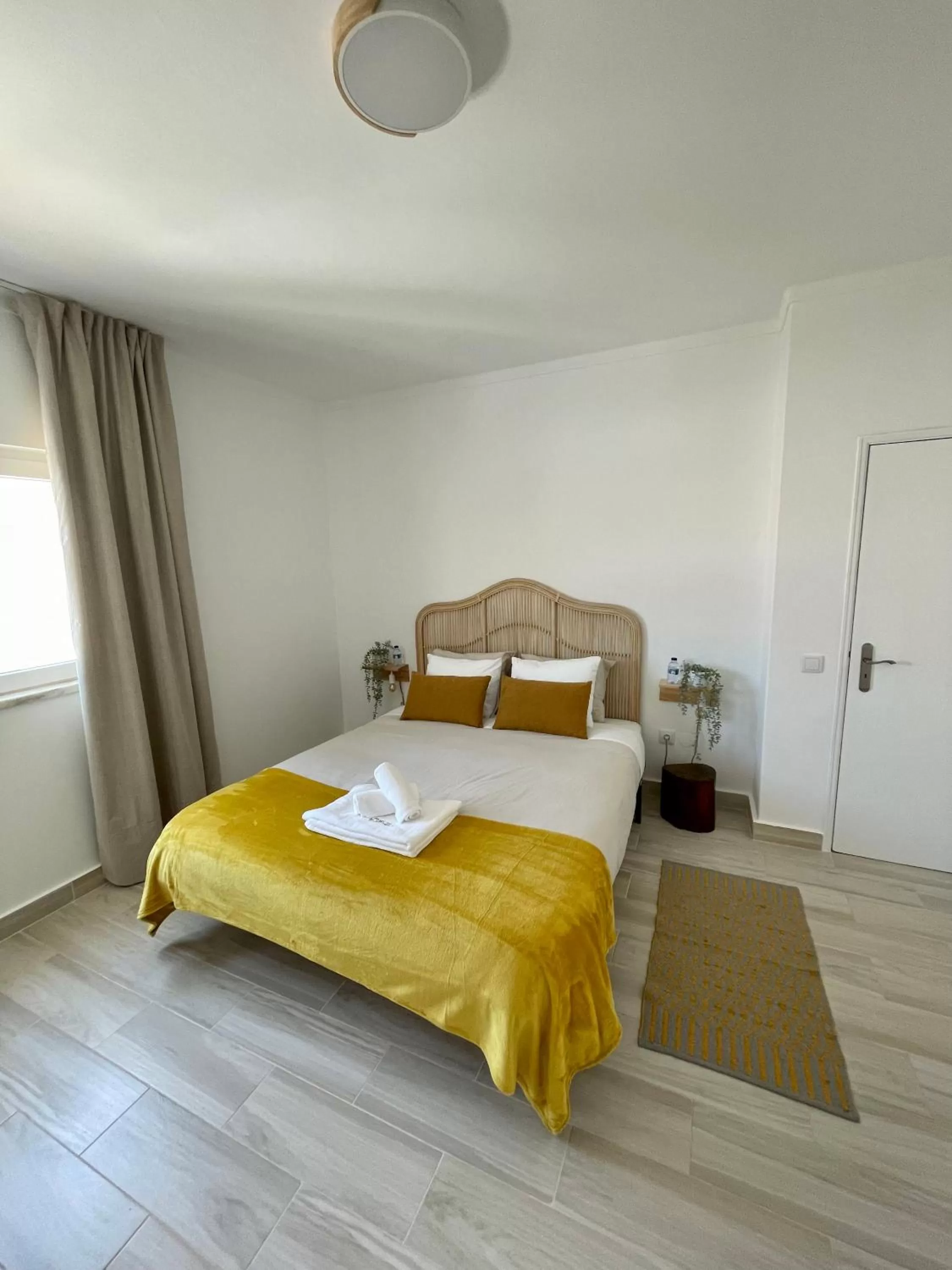 Bed in Galagana Charm House