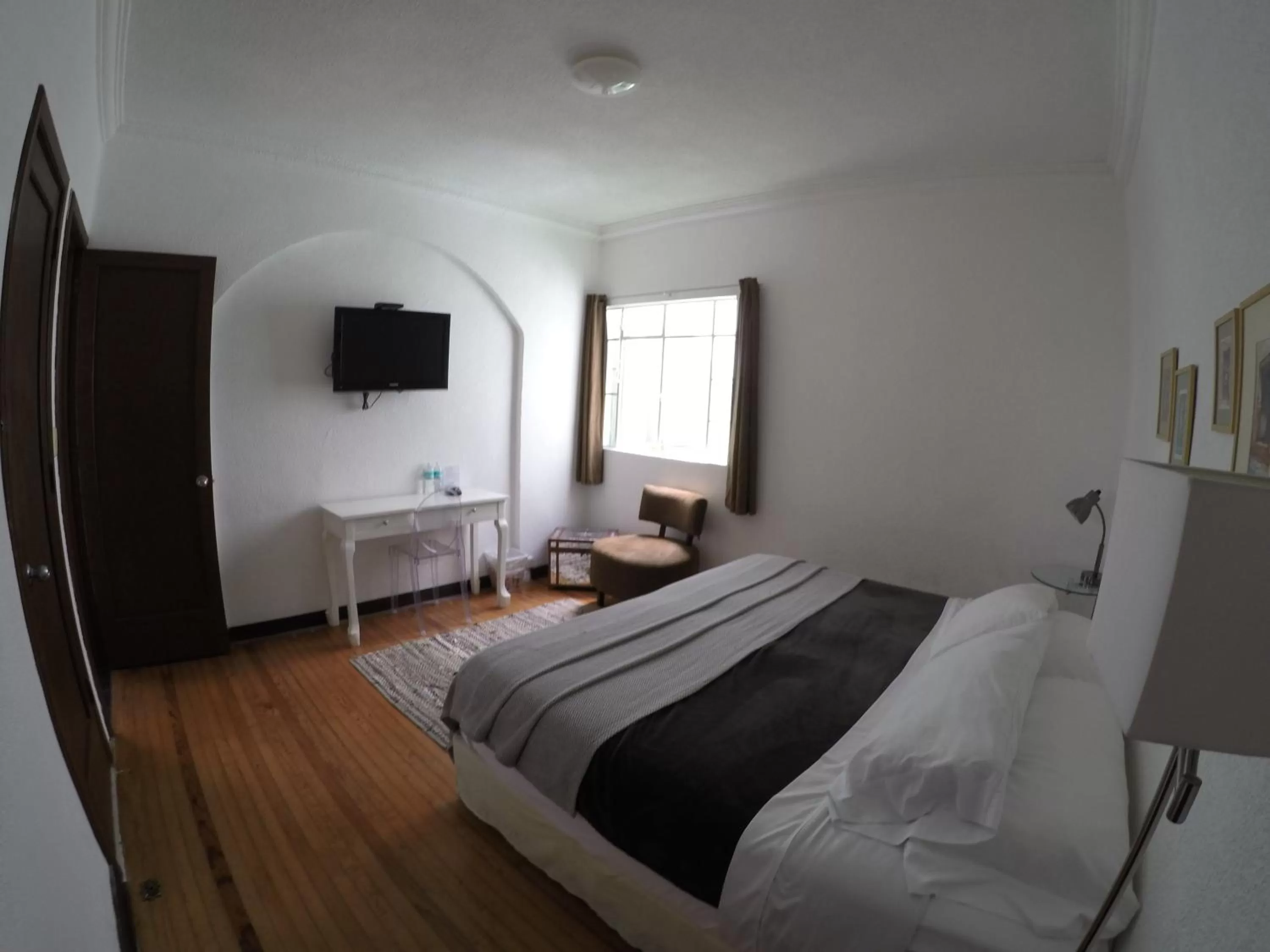 Photo of the whole room, Bed in Distrito Condesa Rooms and Studios