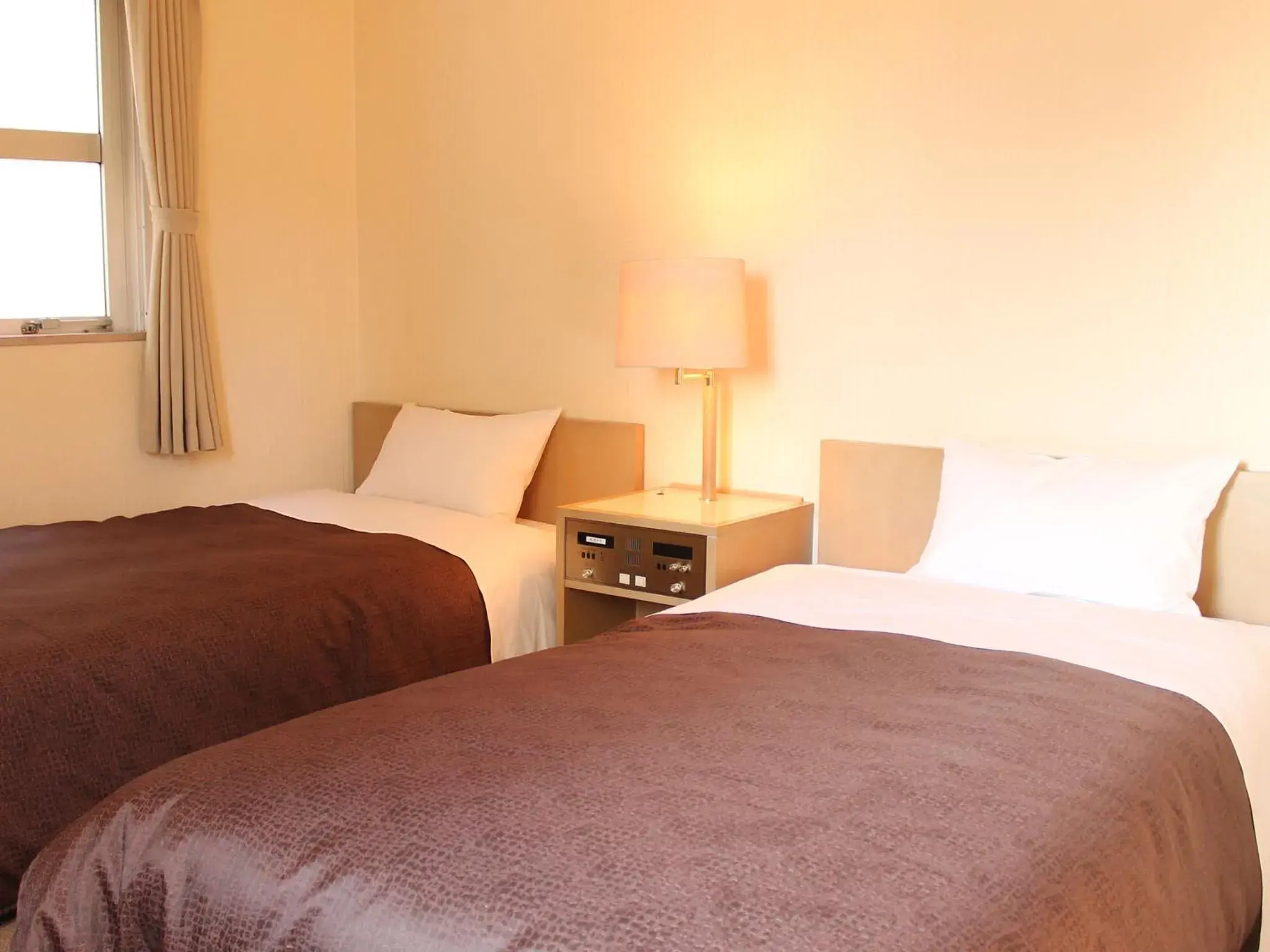 Bed in HOTEL LiVEMAX BUDGET Fuchu Annex
