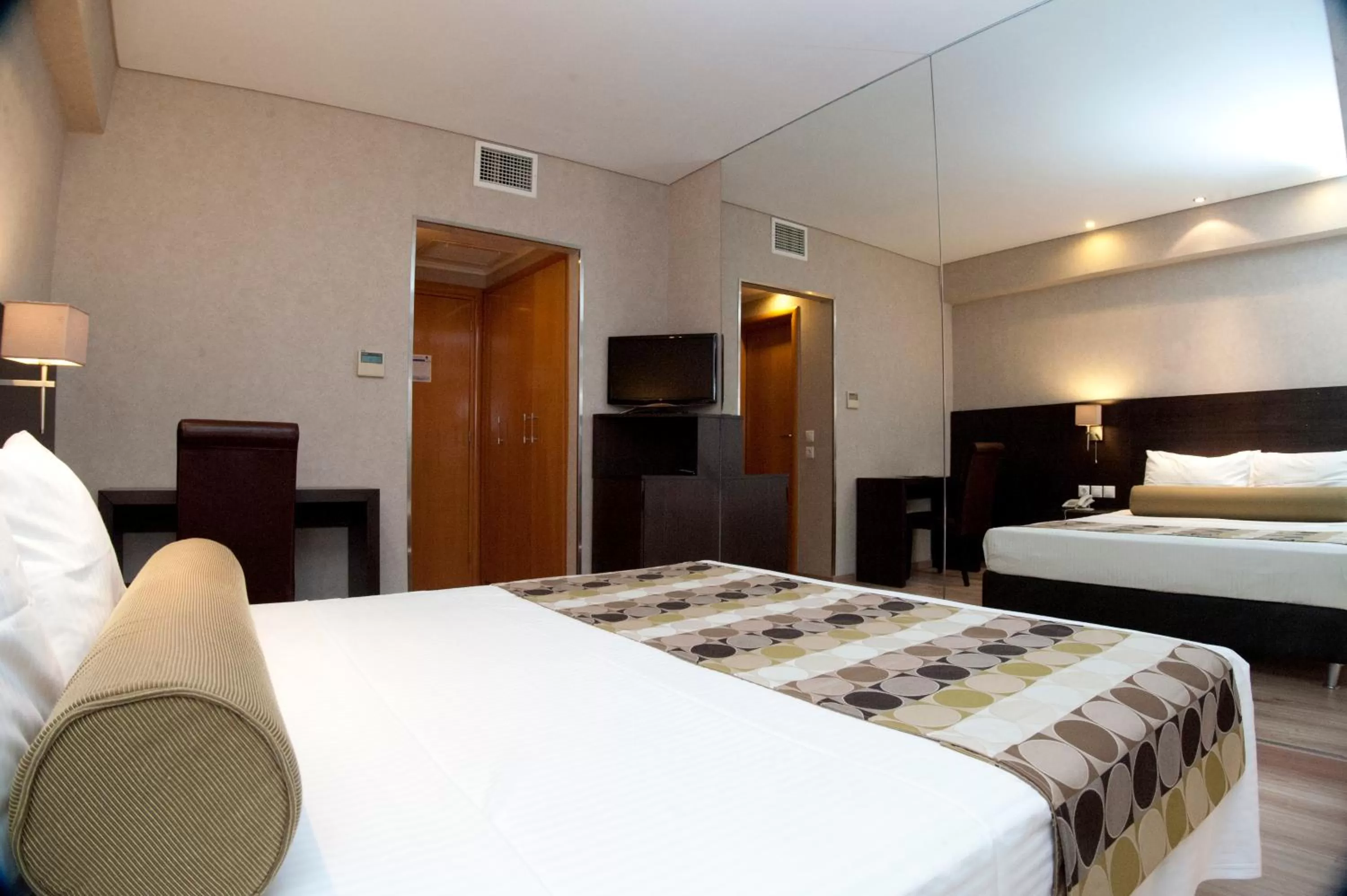 Bed in Nefeli Hotel Alimos