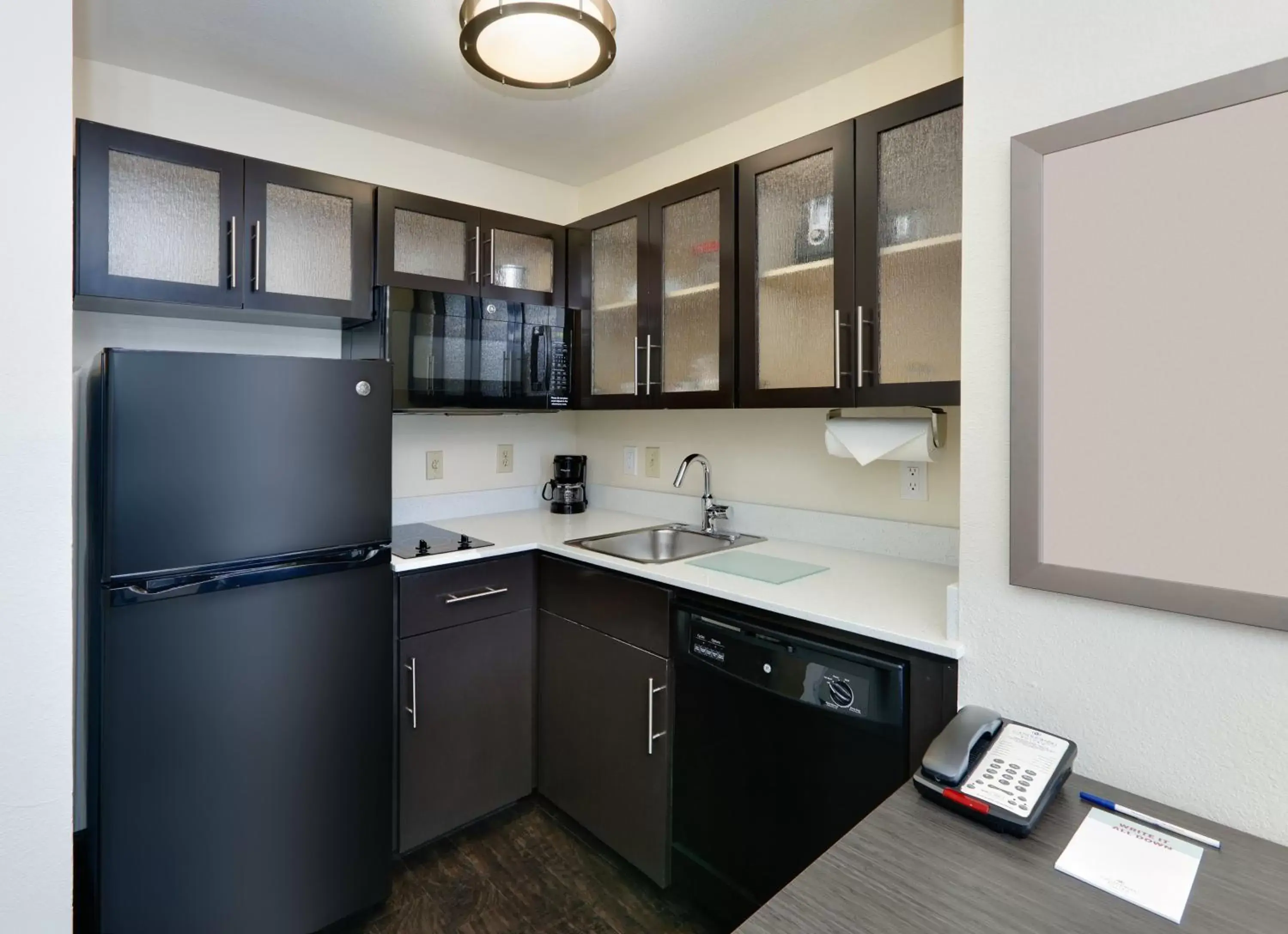Photo of the whole room, Kitchen/Kitchenette in Candlewood Suites Dallas Market Center-Love Field, an IHG Hotel