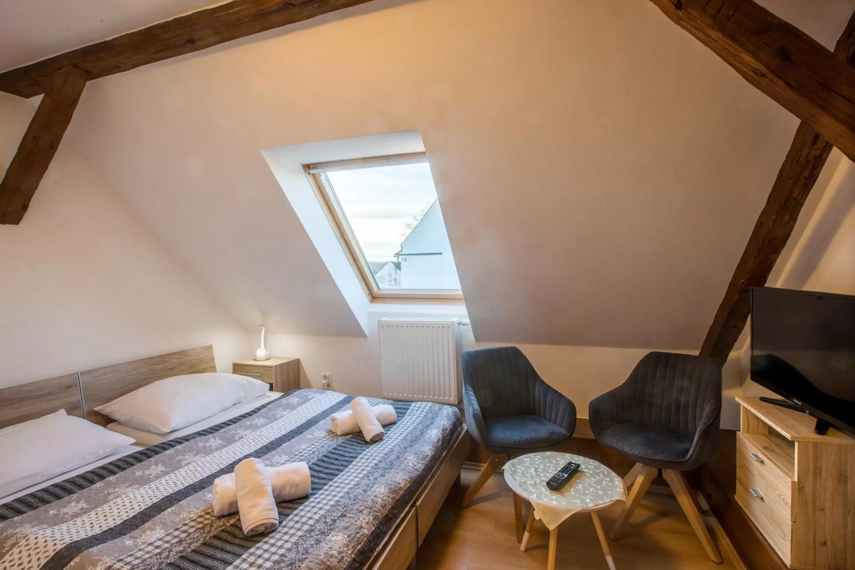 Photo of the whole room, Bed in Wellness hotel & minipivovar Kněžínek