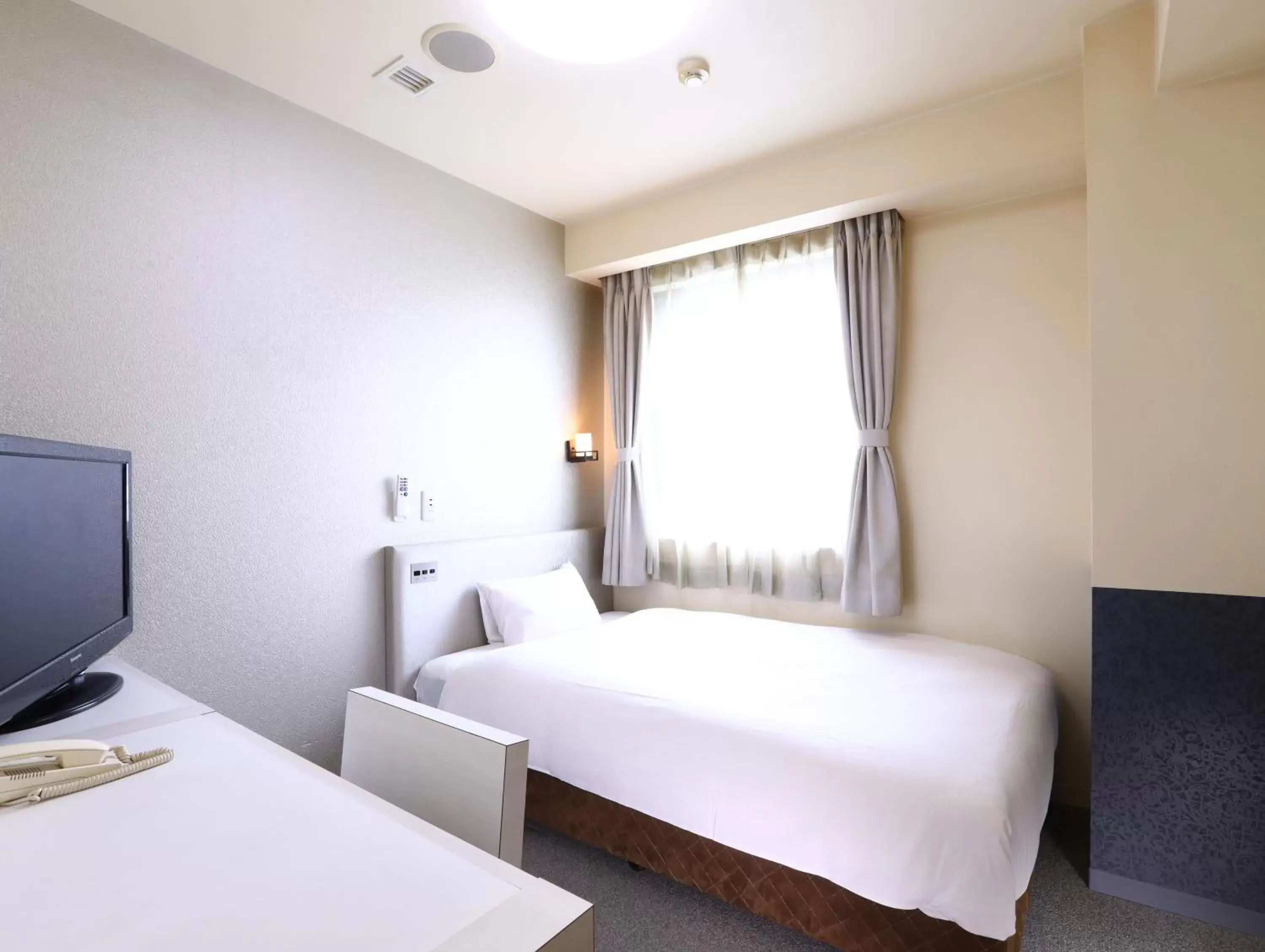 Bed in Hotel Wing International Himeji