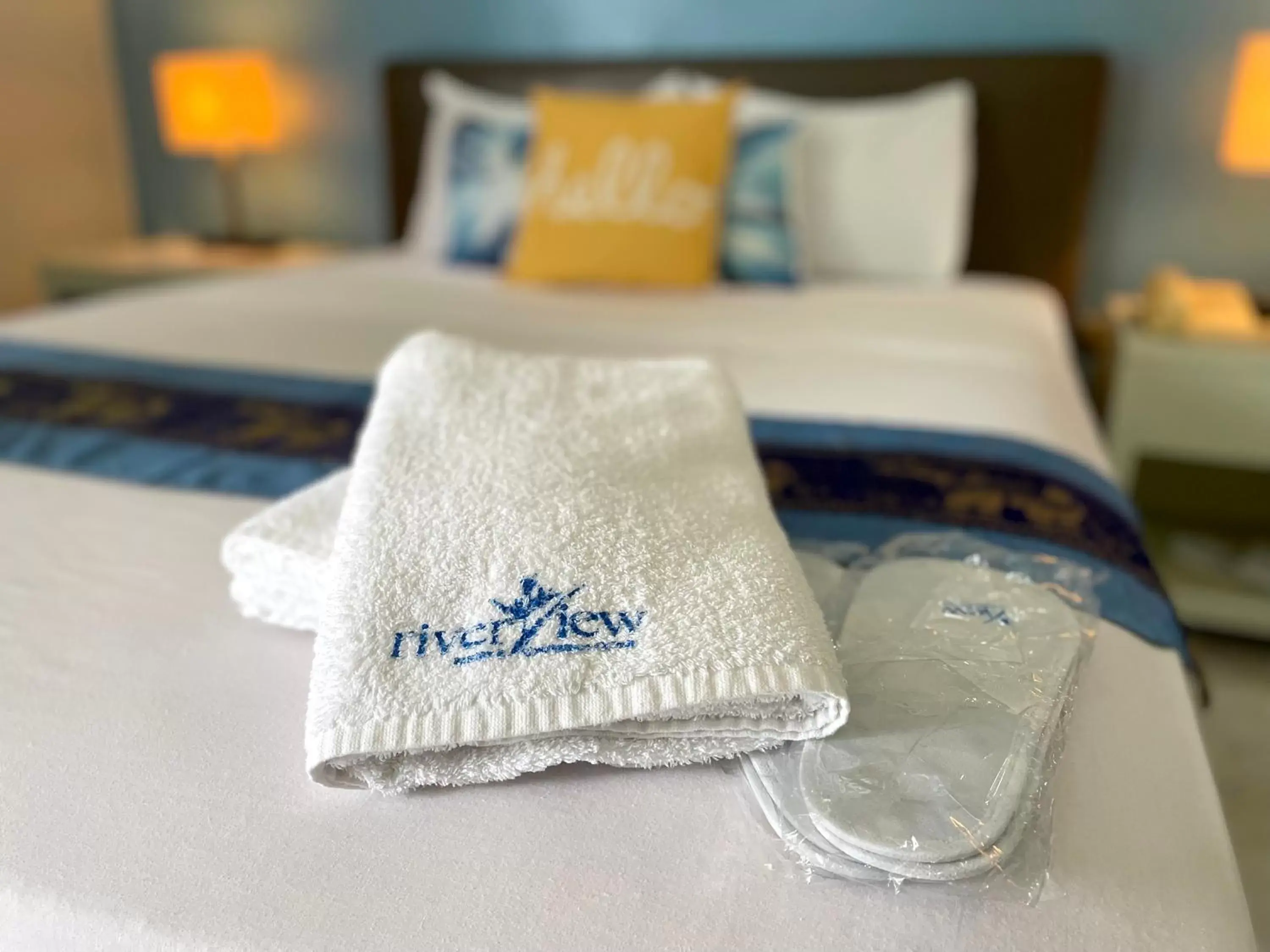 towels, Bed in Riverview Resort and Conference Center