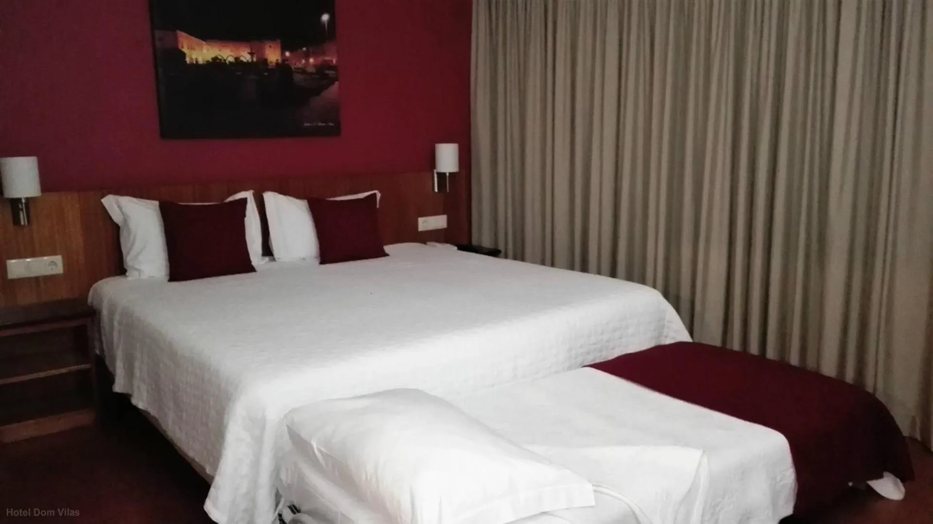 Bed in Hotel Dom Vilas