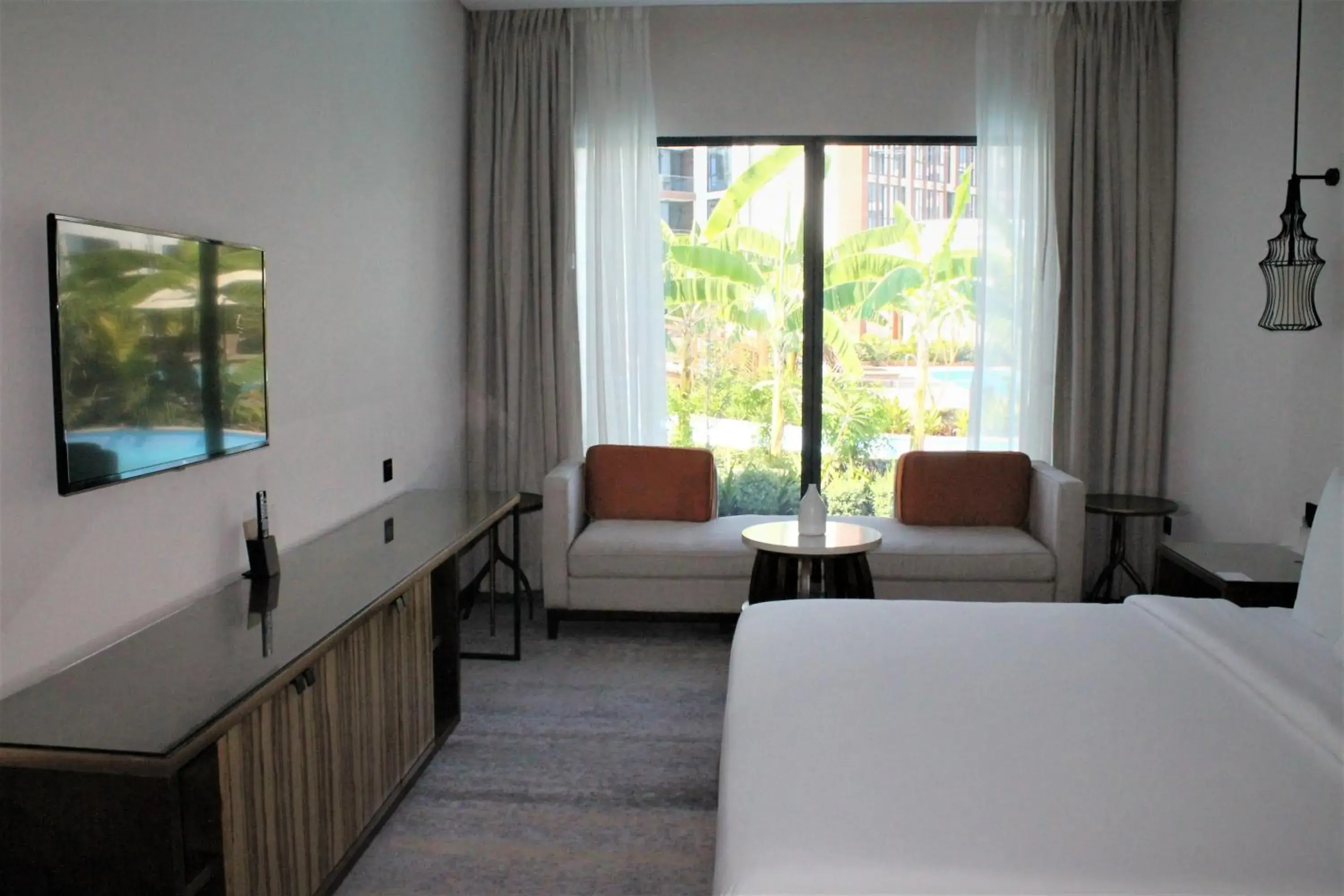 Bedroom, Seating Area in Millennium Resort Salalah