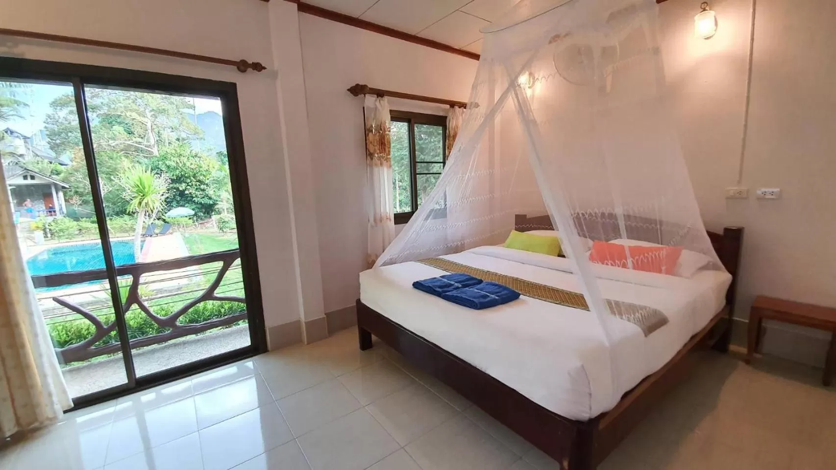 Bed in Tree Tops River Huts