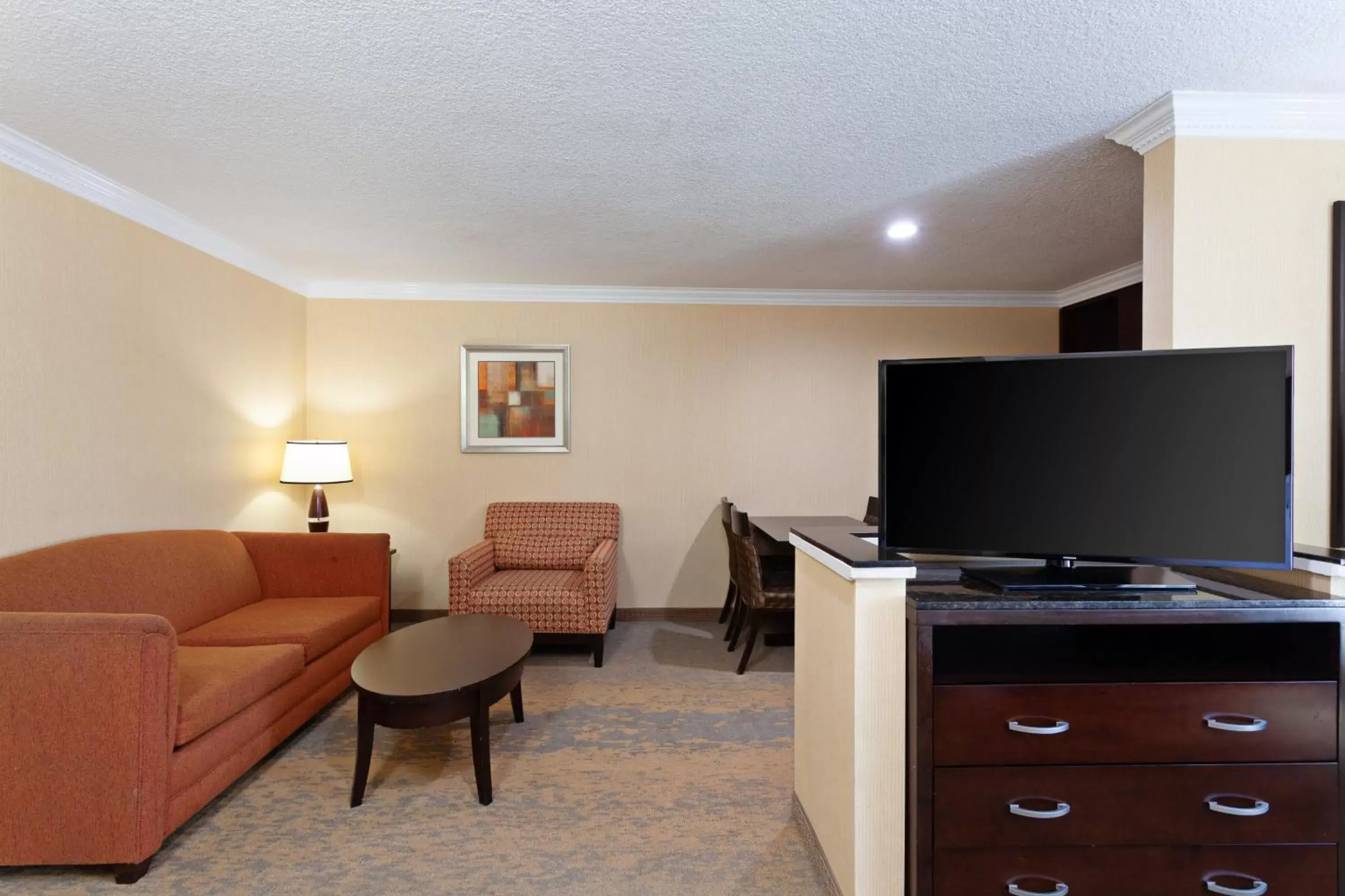 Photo of the whole room, TV/Entertainment Center in Holiday Inn & Suites San Mateo - SFO, an IHG Hotel