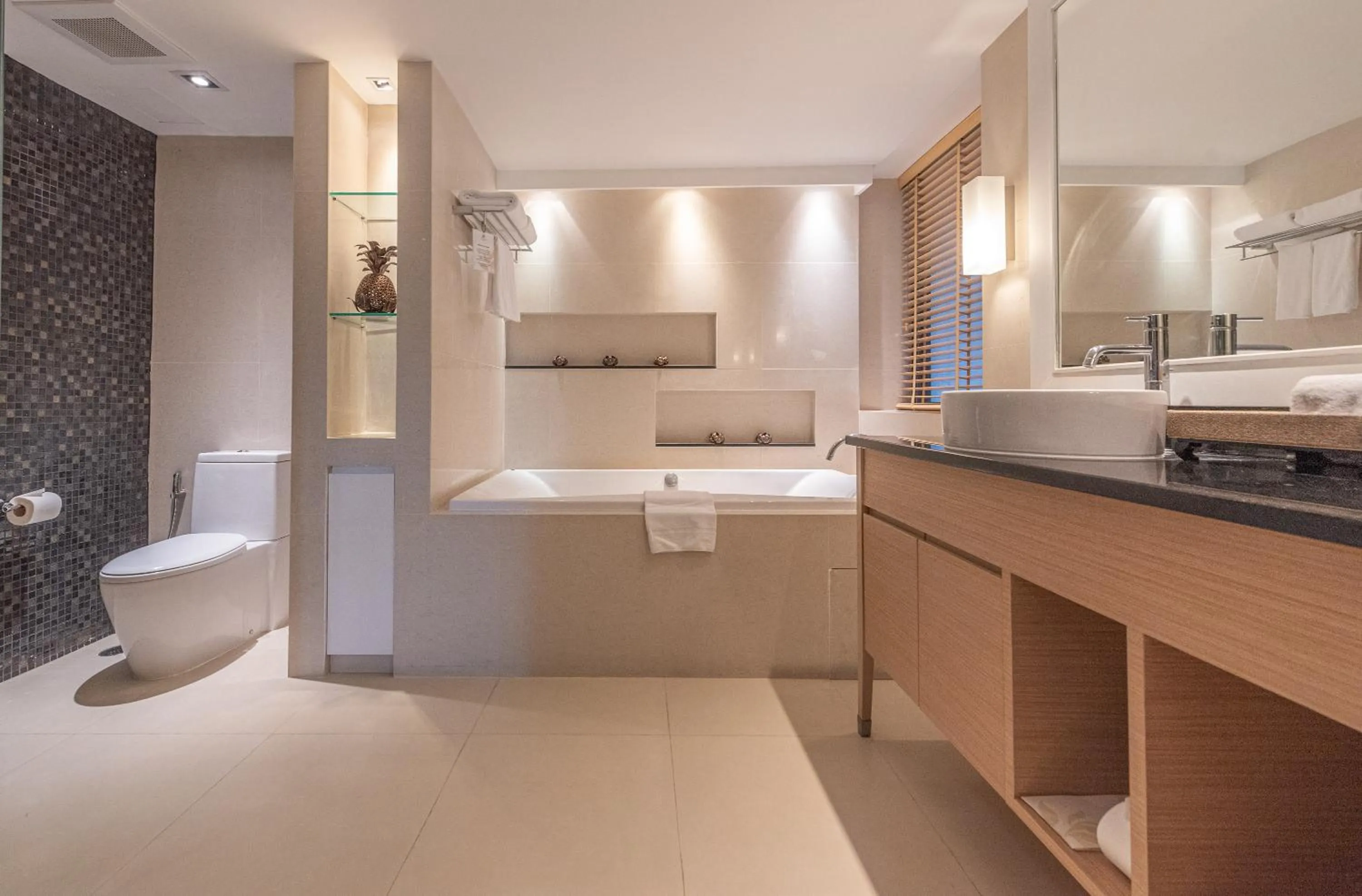 Bathroom in Summit Windmill Golf Suite Hotel at Suvarnabhumi