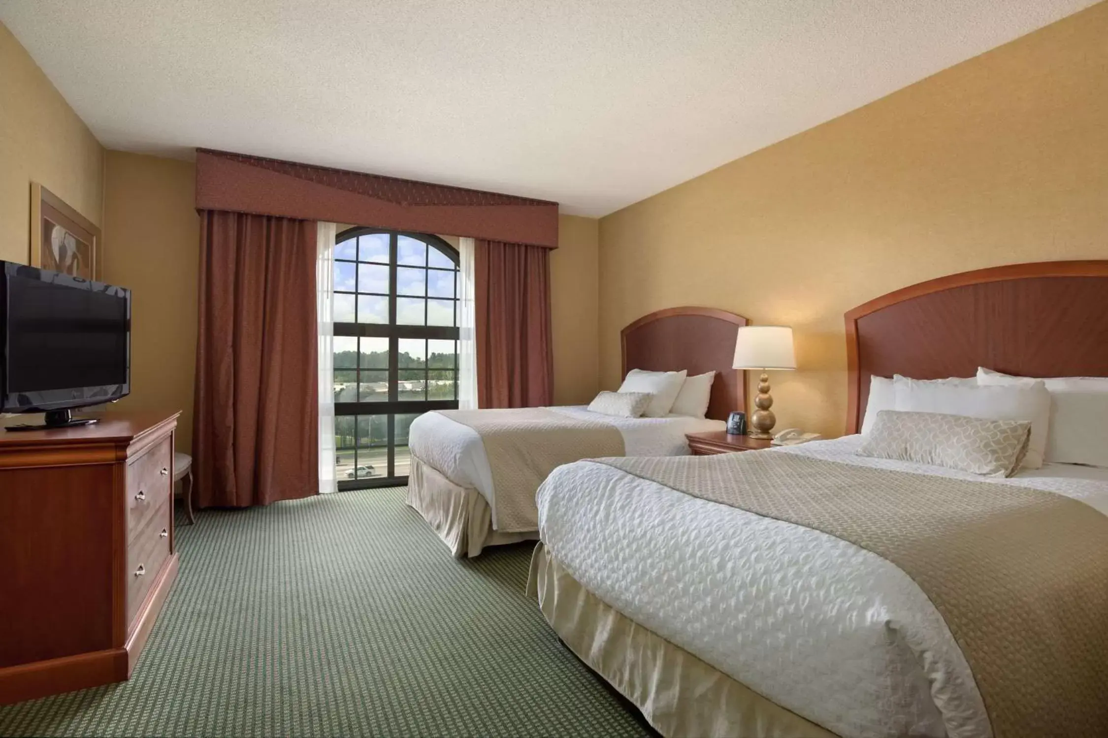 Bed in Embassy Suites by Hilton Greensboro Airport