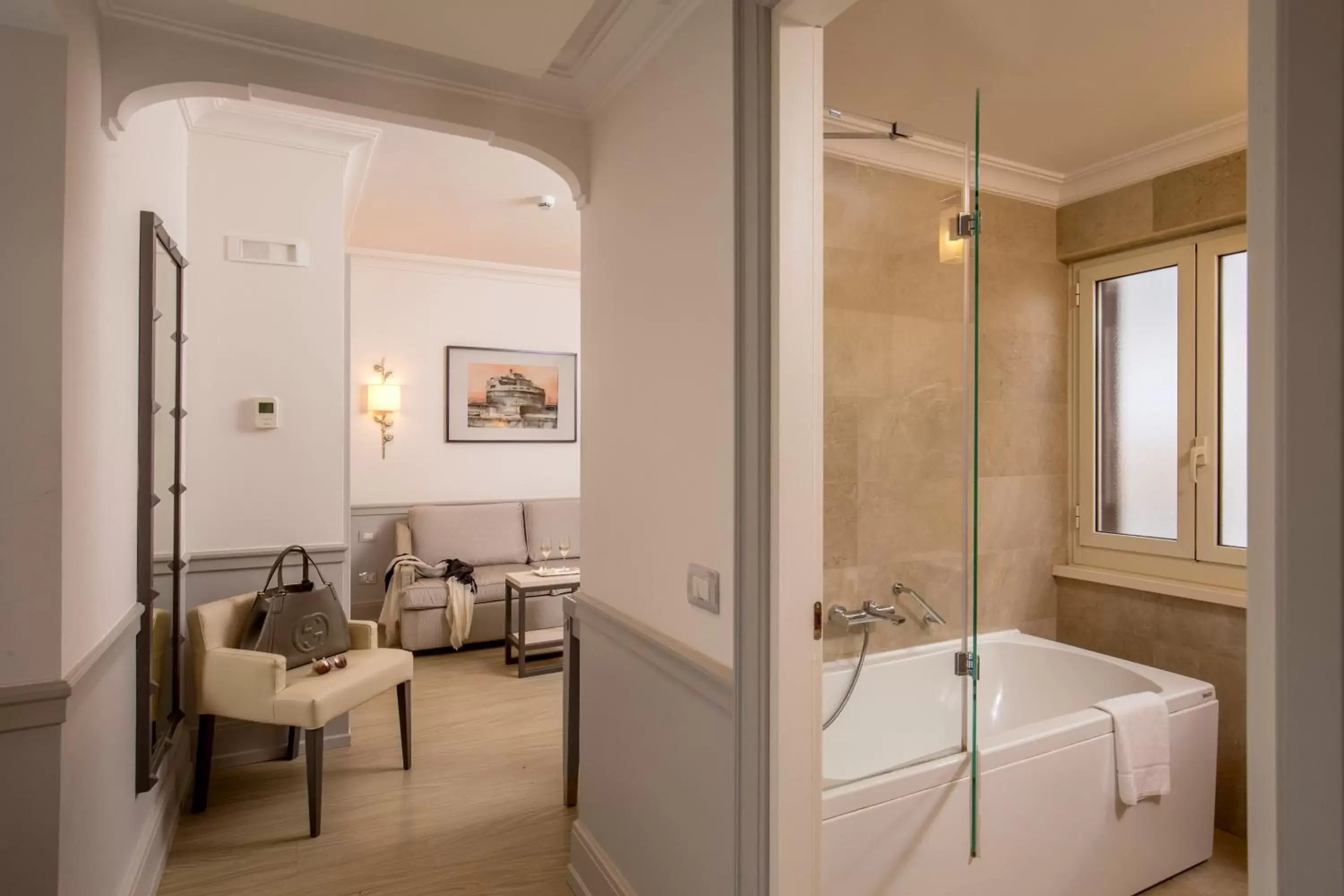 Living room, Bathroom in Hotel Della Conciliazione