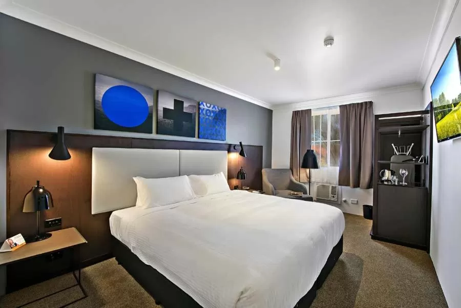 Bed in Silkari Urban CKS Sydney Airport Hotel