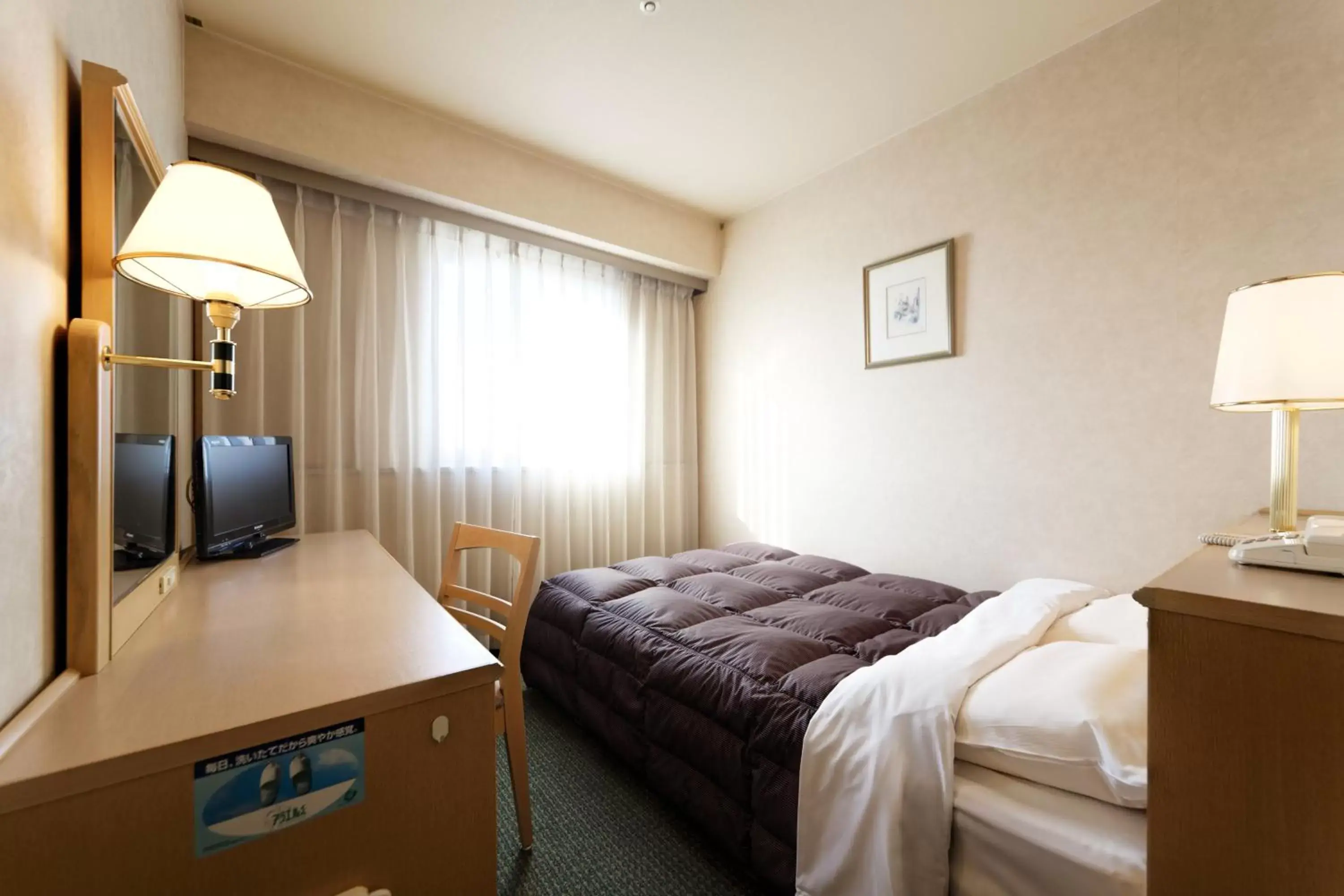 Bed in Kurume Washington Hotel Plaza