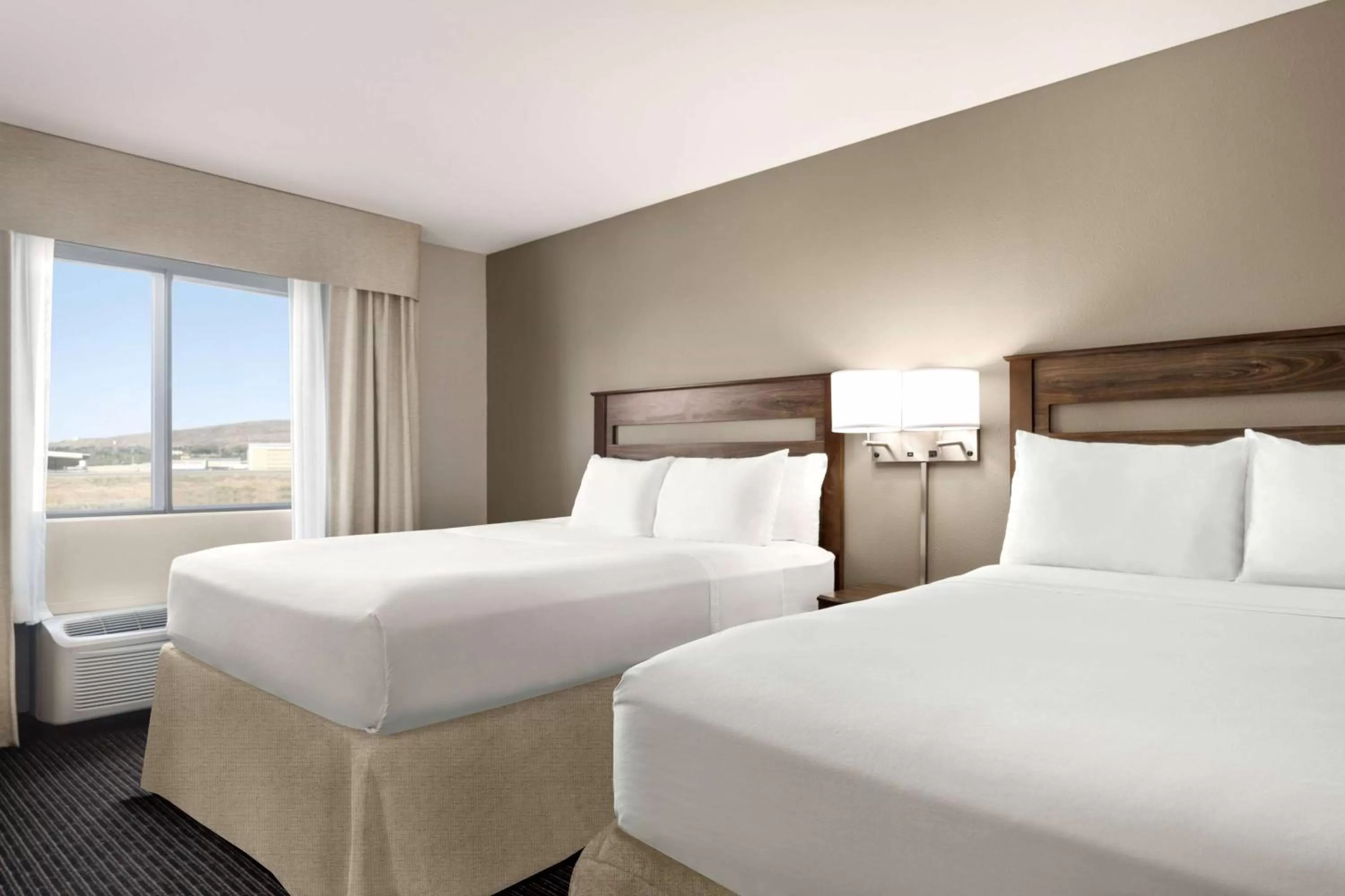 Photo of the whole room, Bed in Baymont by Wyndham Rawlins