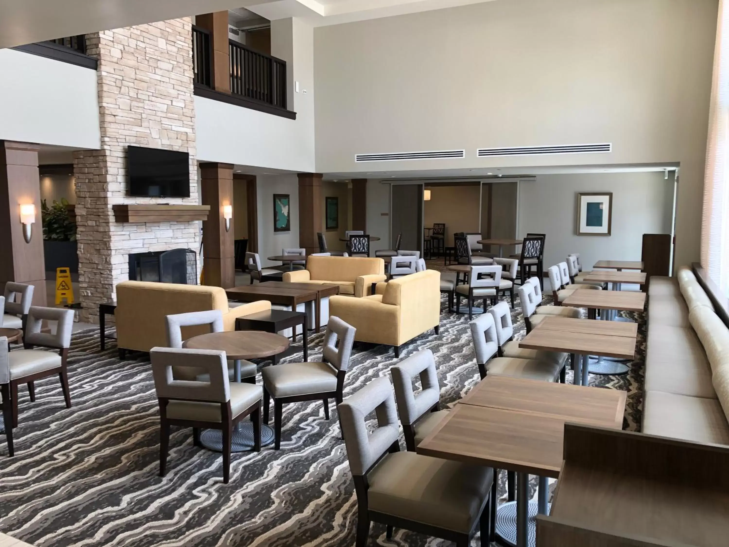 Communal lounge/ TV room, Restaurant/Places to Eat in Staybridge Suites Irvine - John Wayne Airport, an IHG Hotel