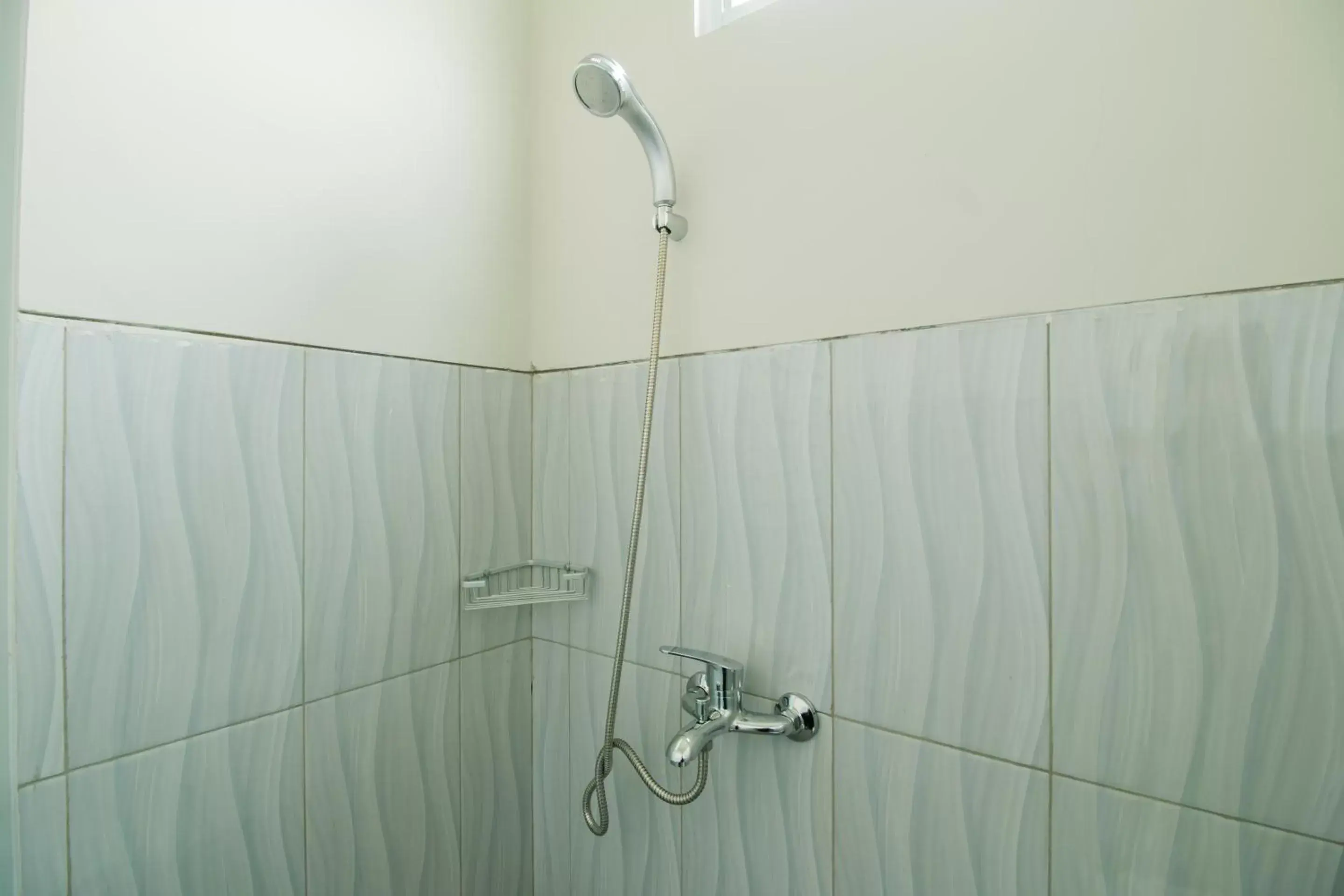 Bathroom in OYO 1078 Fakhira Residence