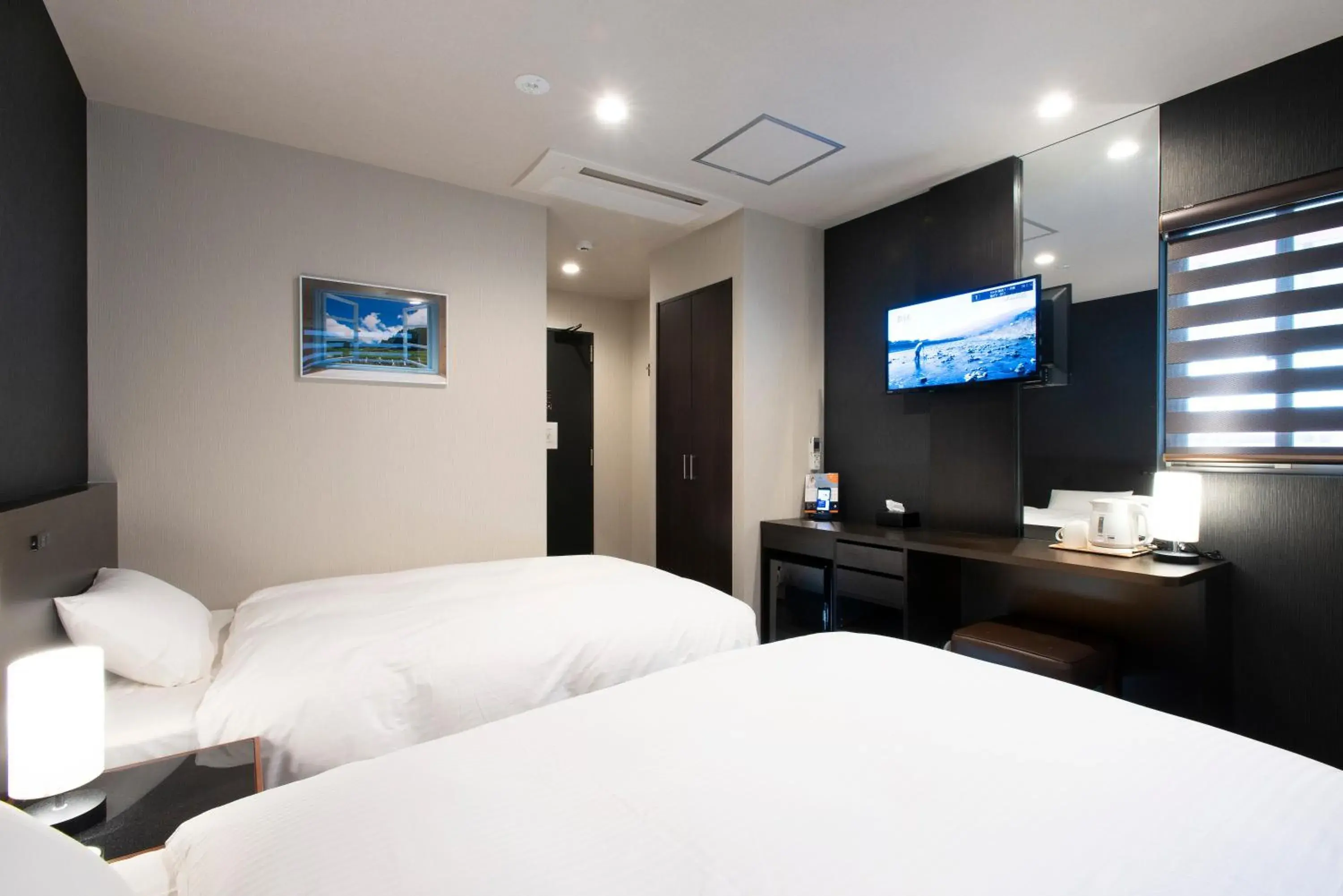 Communal lounge/ TV room, Bed in Hotel Kojan Communal lounge/ TV room, Bed in Hotel Kojan