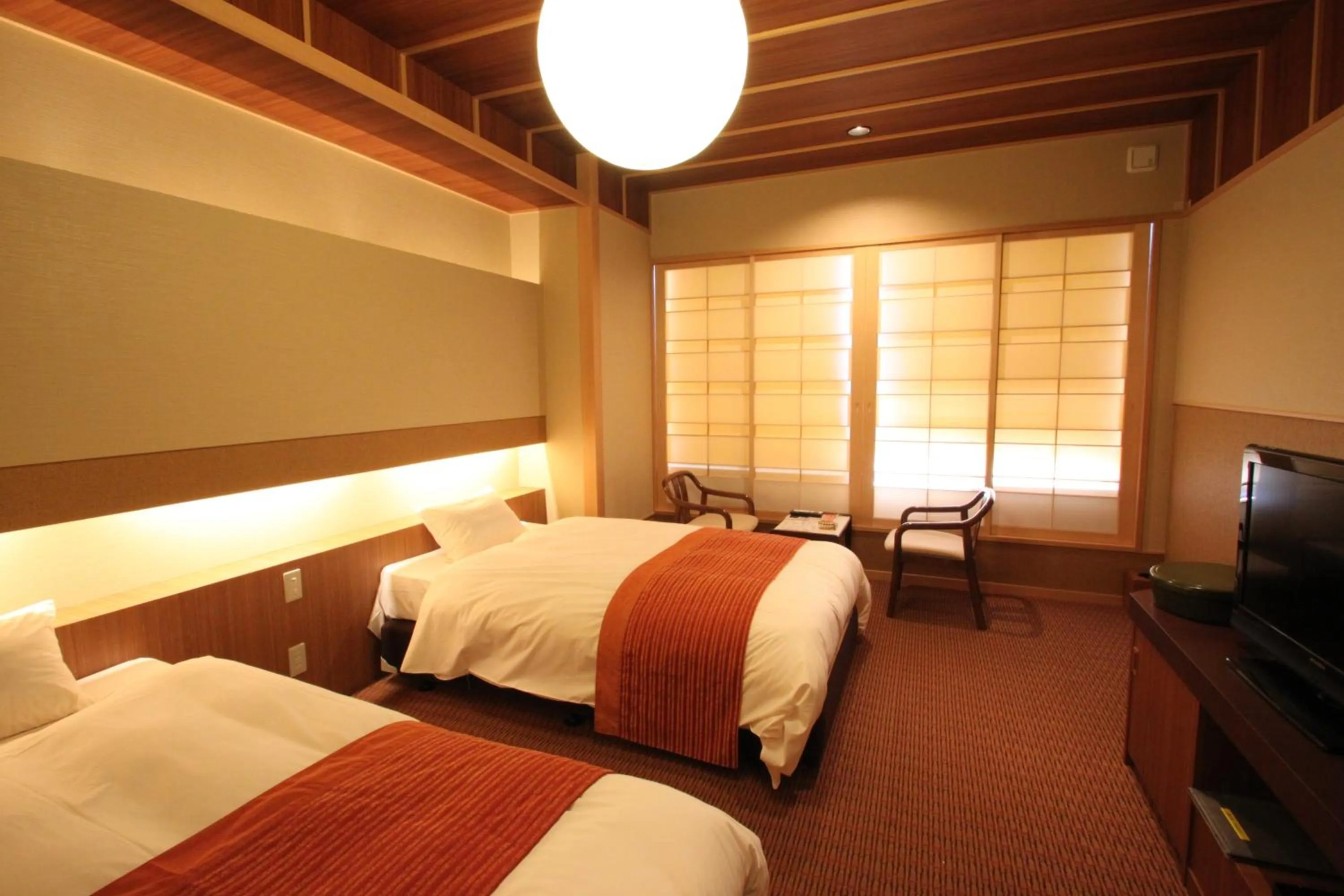 Bed in Ogoto Onsen Yunoyado Komolebi