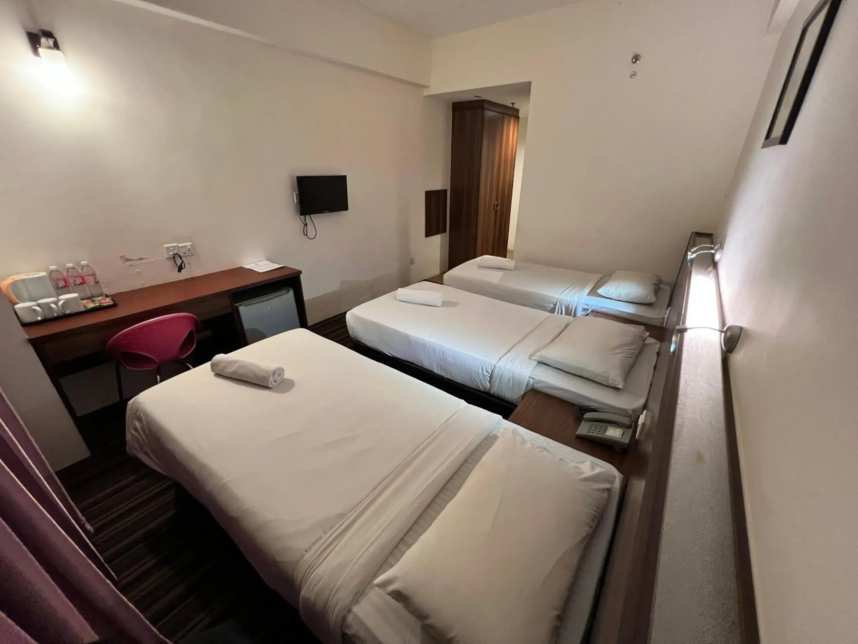 Bed in Hotel Yt Midtown Kuala Terengganu