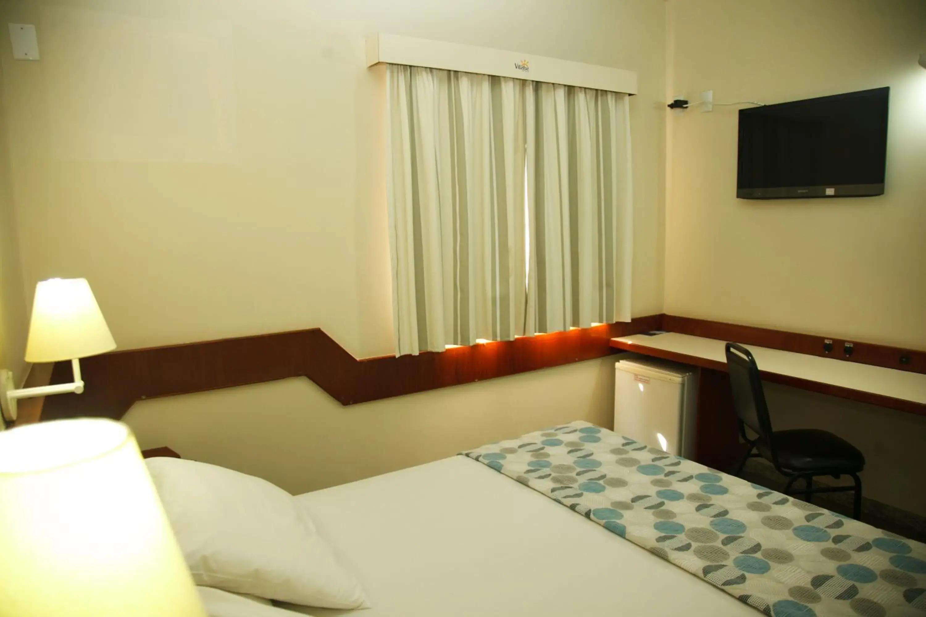 Bedroom, TV/Entertainment Center in Villalba Hotel