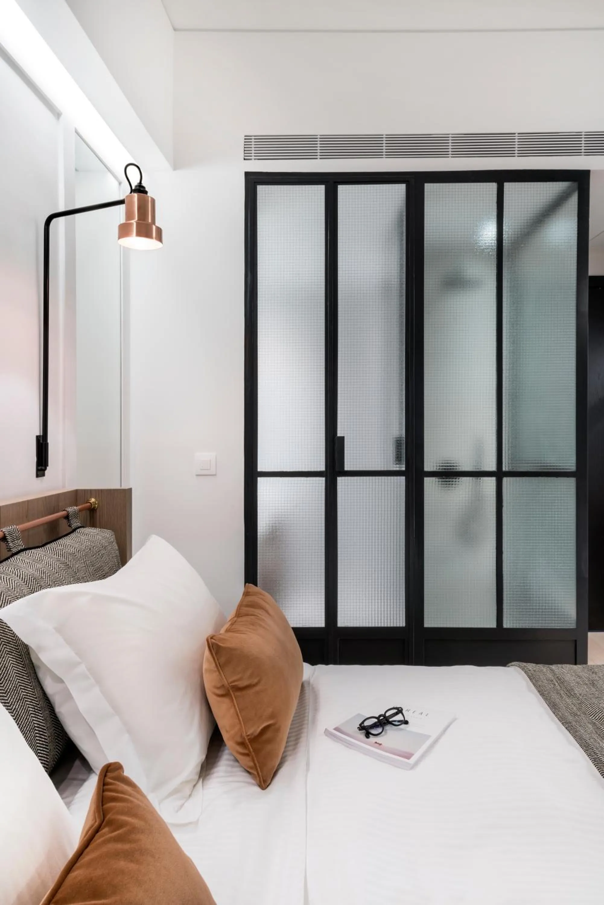 Bed in Niki Athens Hotel