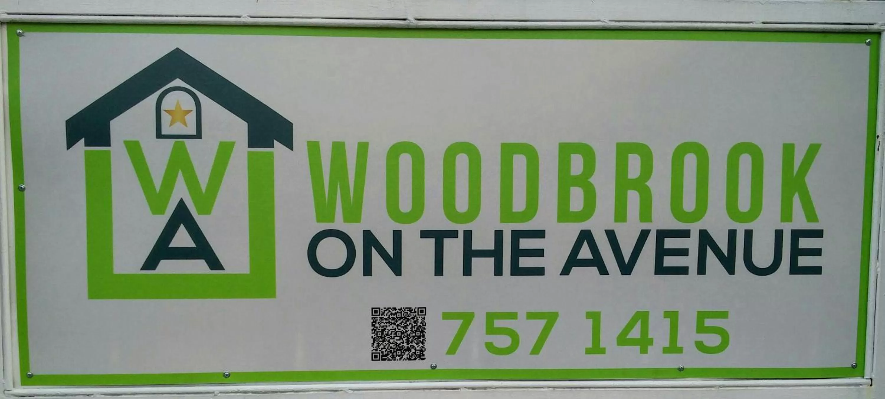 Property logo or sign in Woodbrook on the Avenue