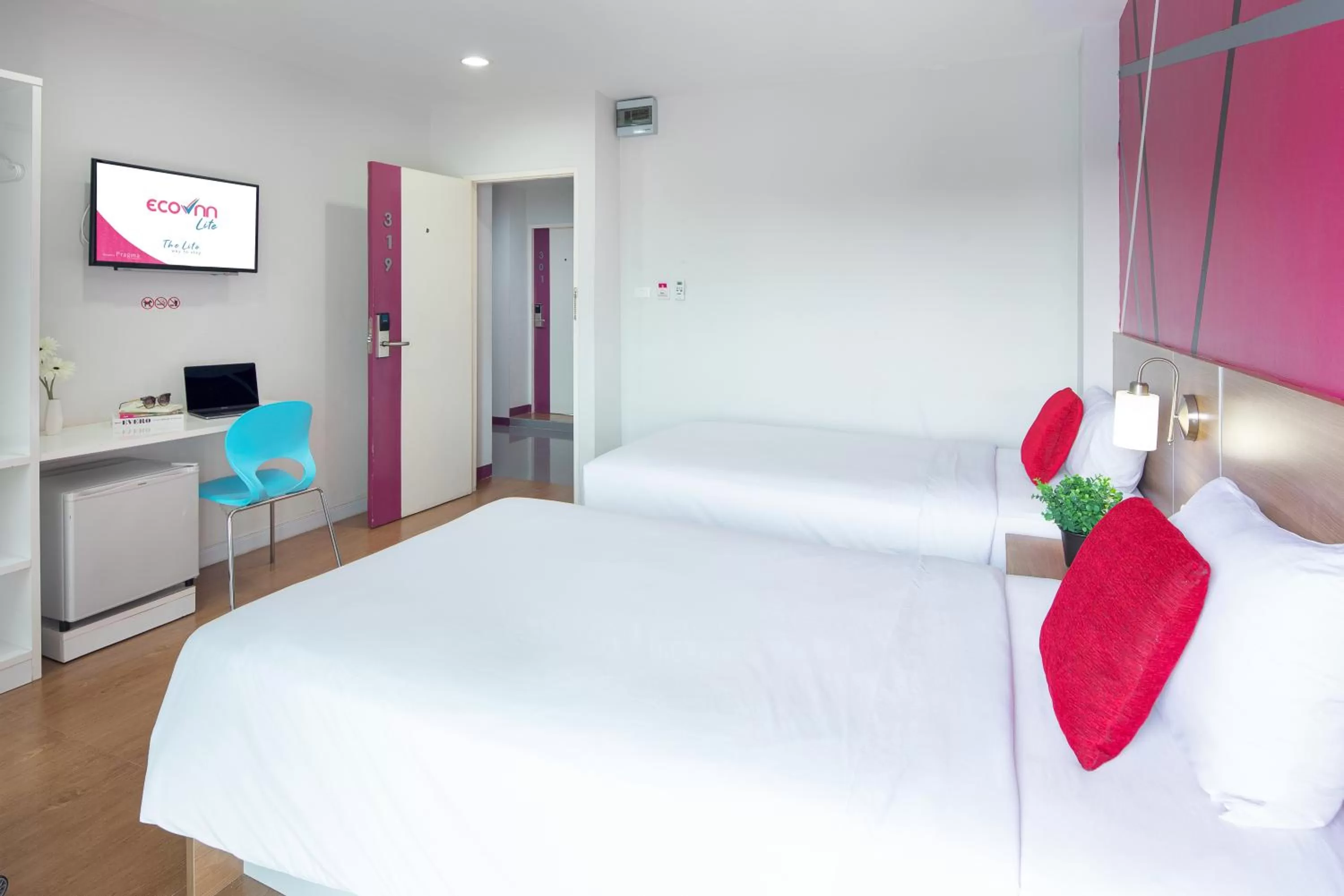 Bed in Eco Inn Lite Chanthaburi