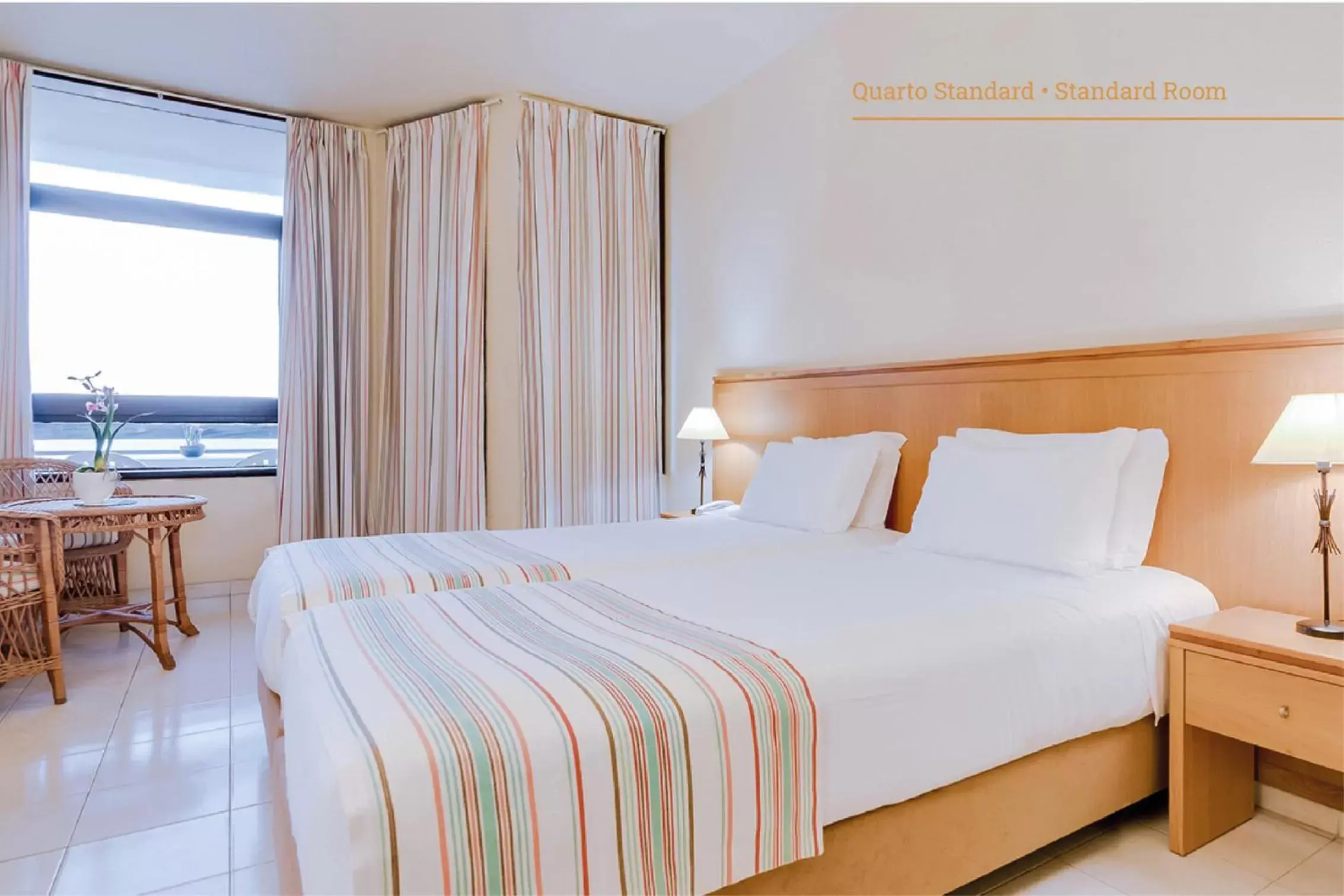 Bed in Auramar Beach Resort